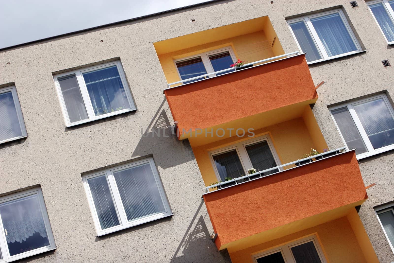 Detail of orange and yellow prefab house by haak78