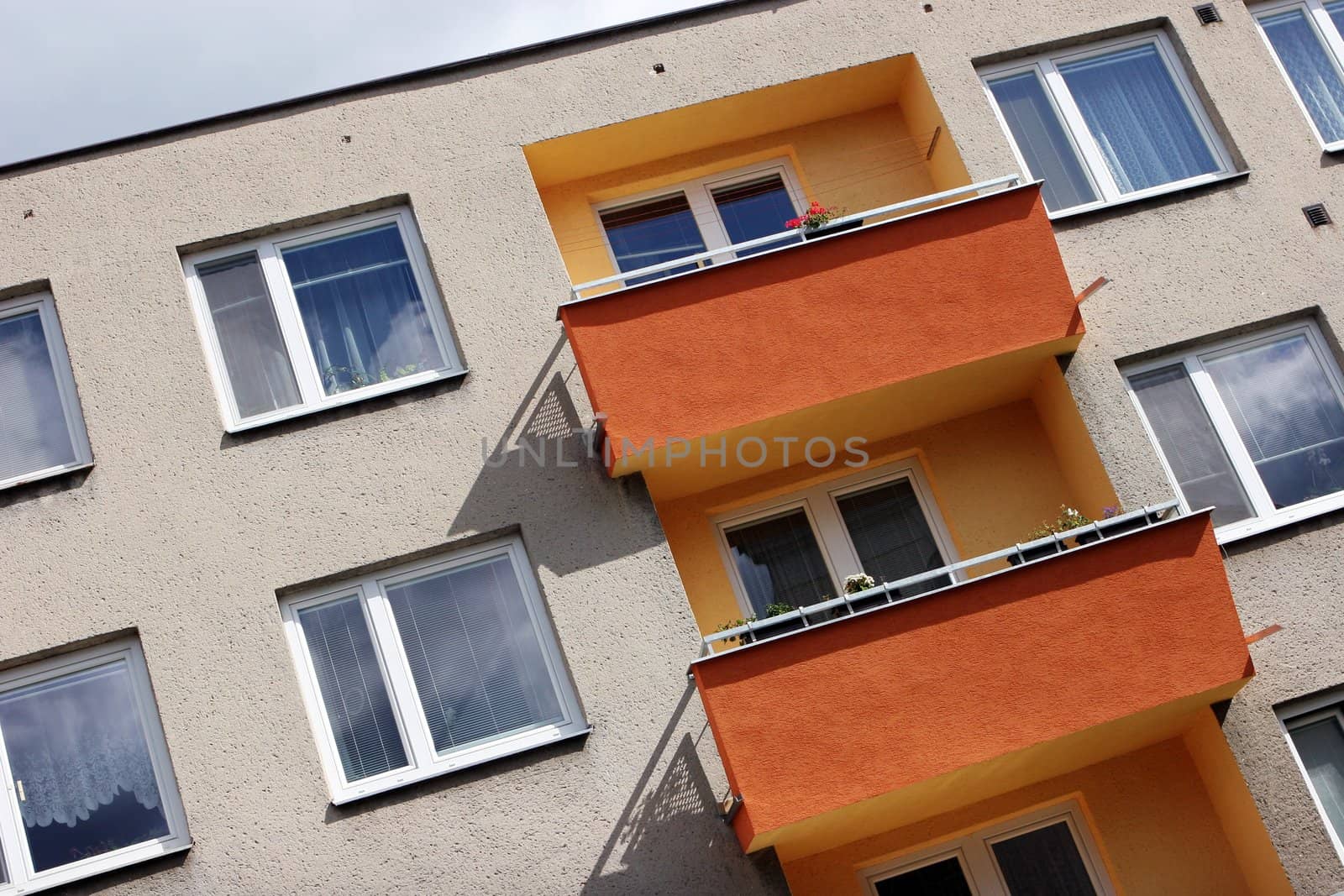 Detail of orange and yellow prefab house