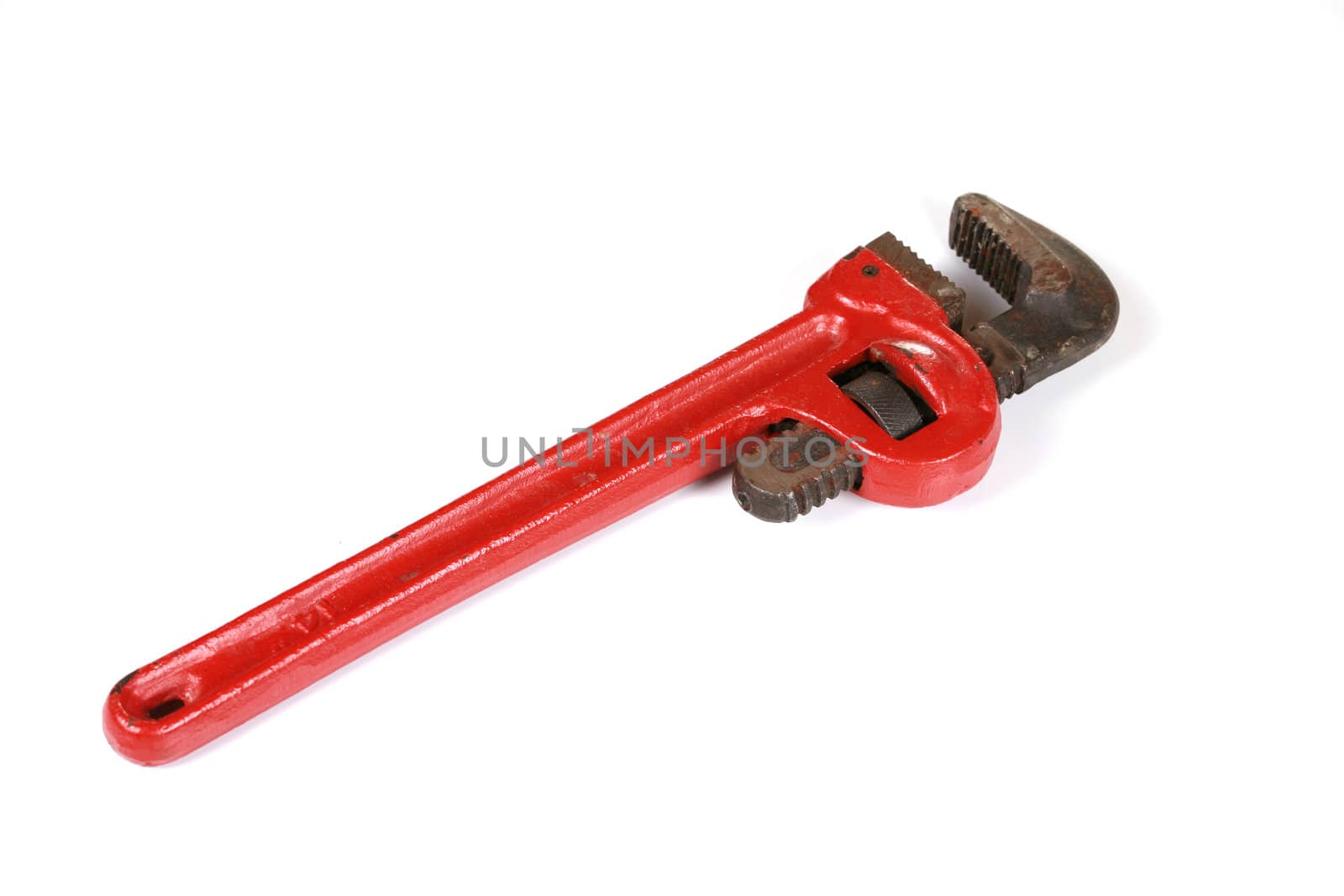 Red pipe wrench isolated on white