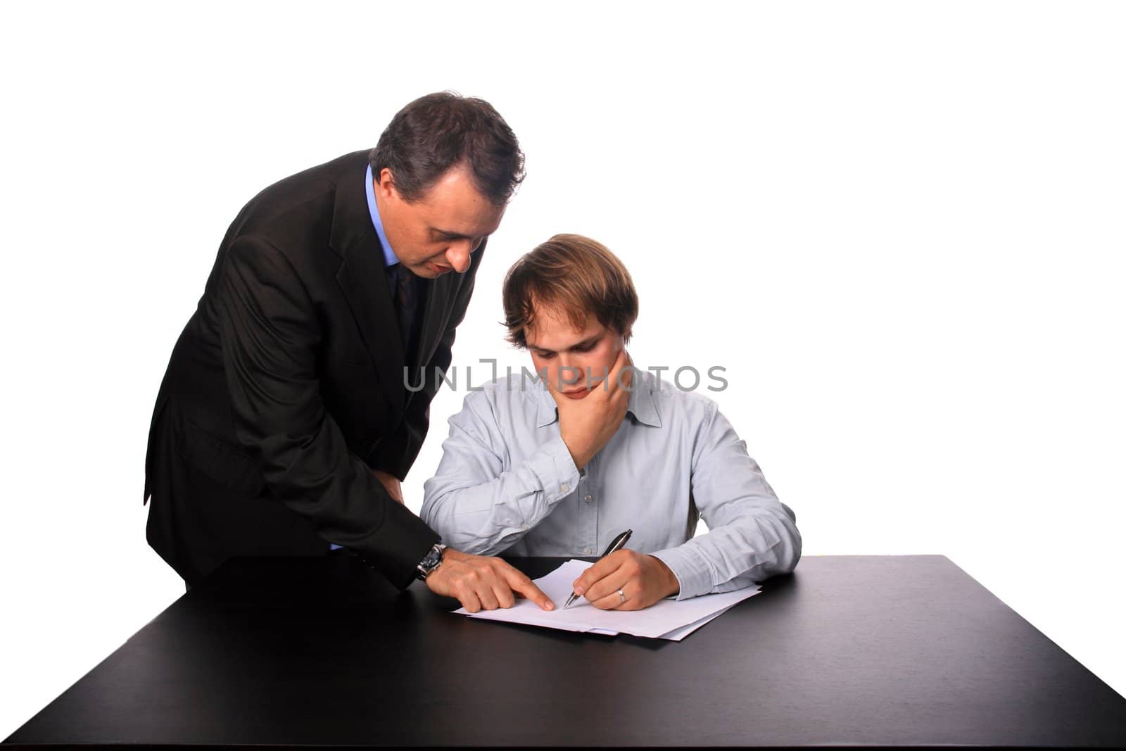 businessman signing contract by jpcasais