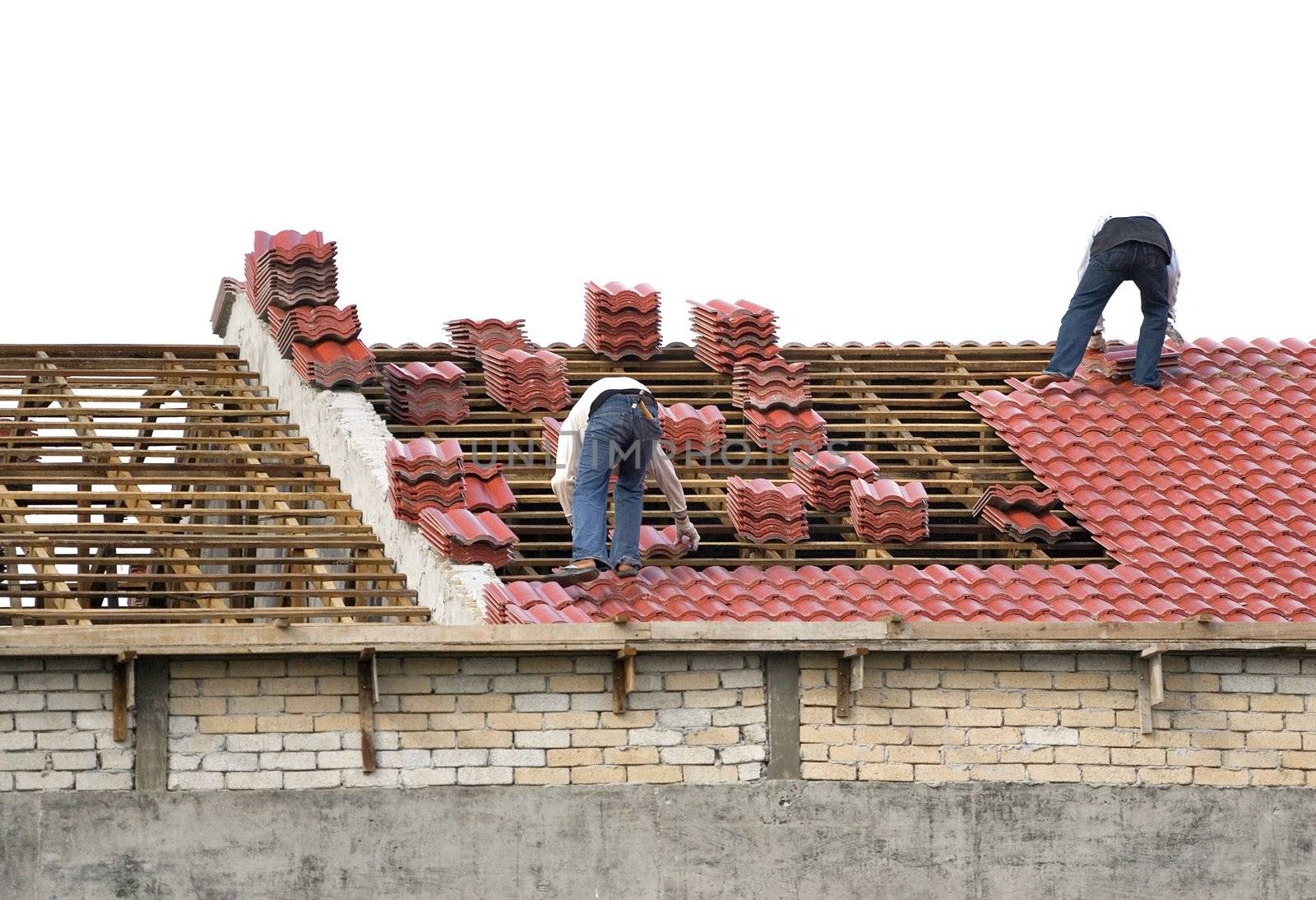 Workers Laying Roof Tiles by shariffc