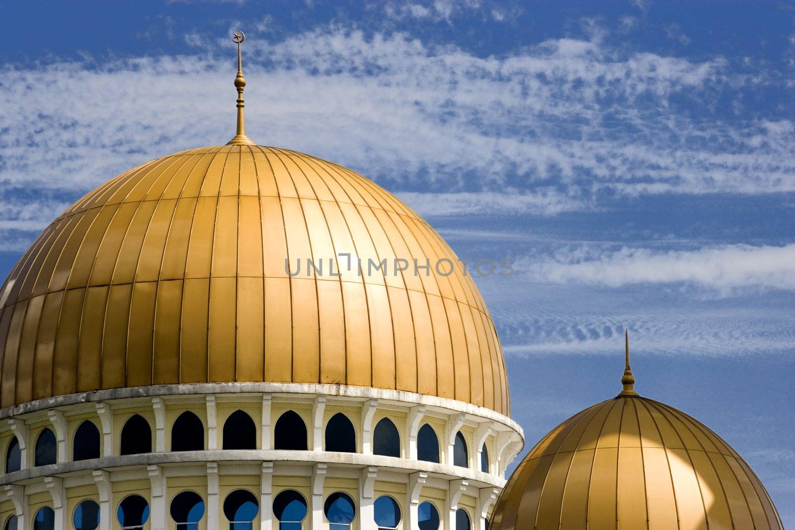 Mosque with gold coloured domes in Malaysia.