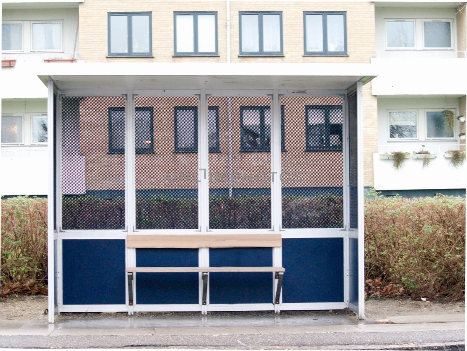 Urban bus stop in the suburbs with copyspace