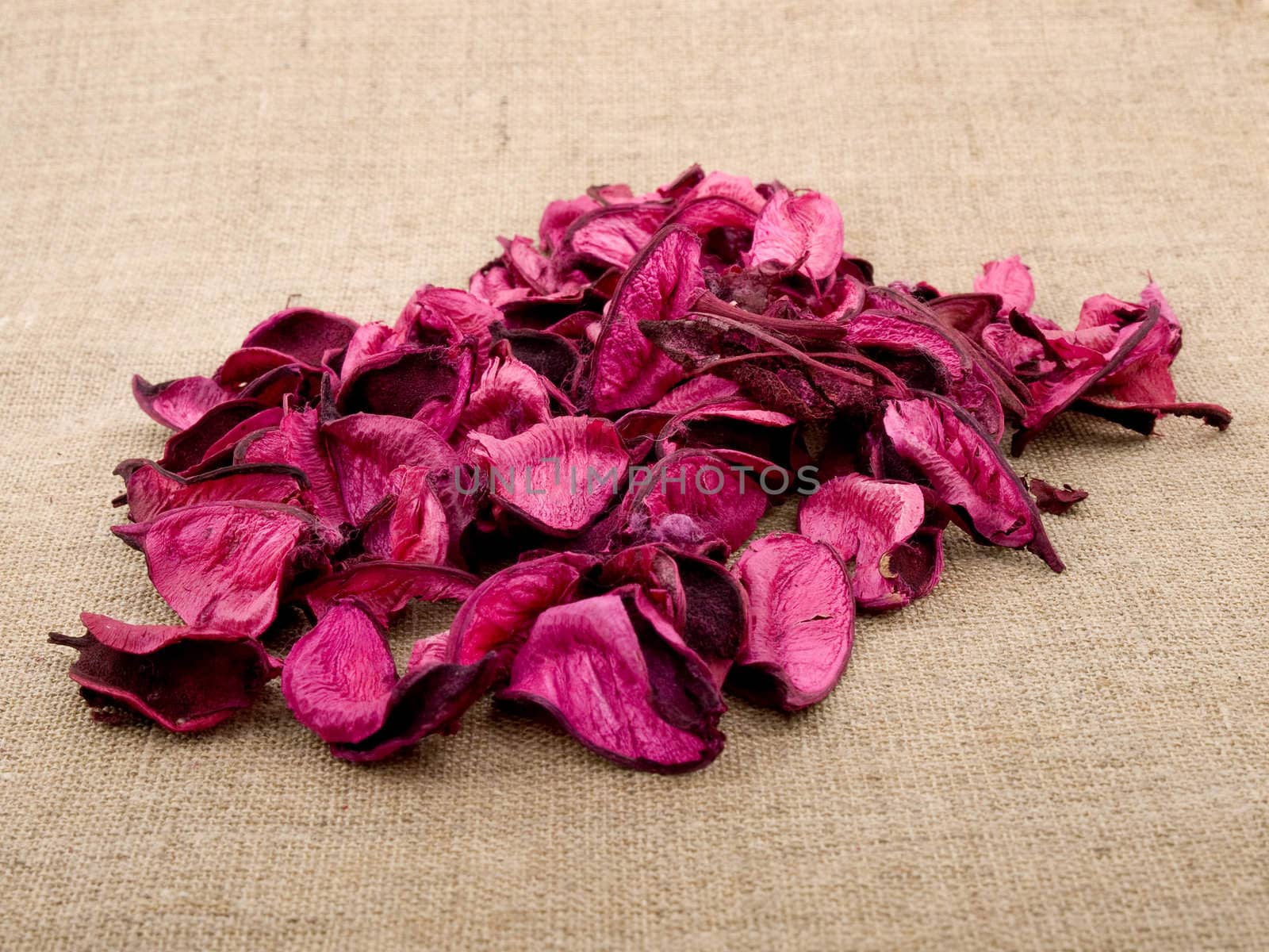 Pink potpourri  on linen background