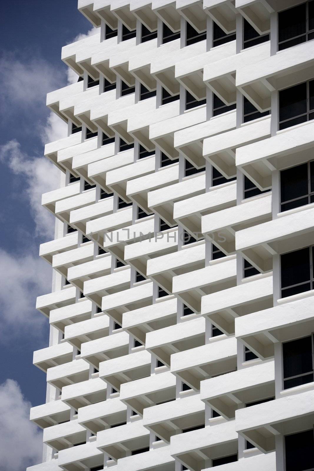 The symmetry of many apartment balconies.