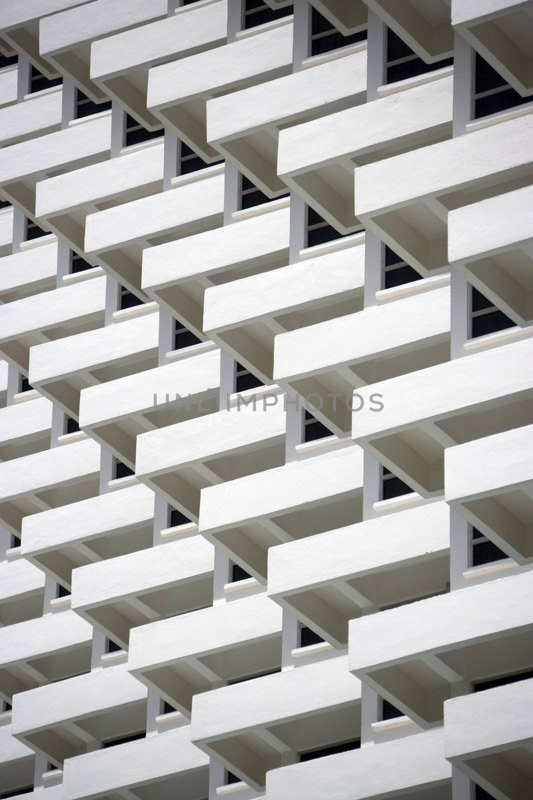 The symmetry of many apartment balconies.