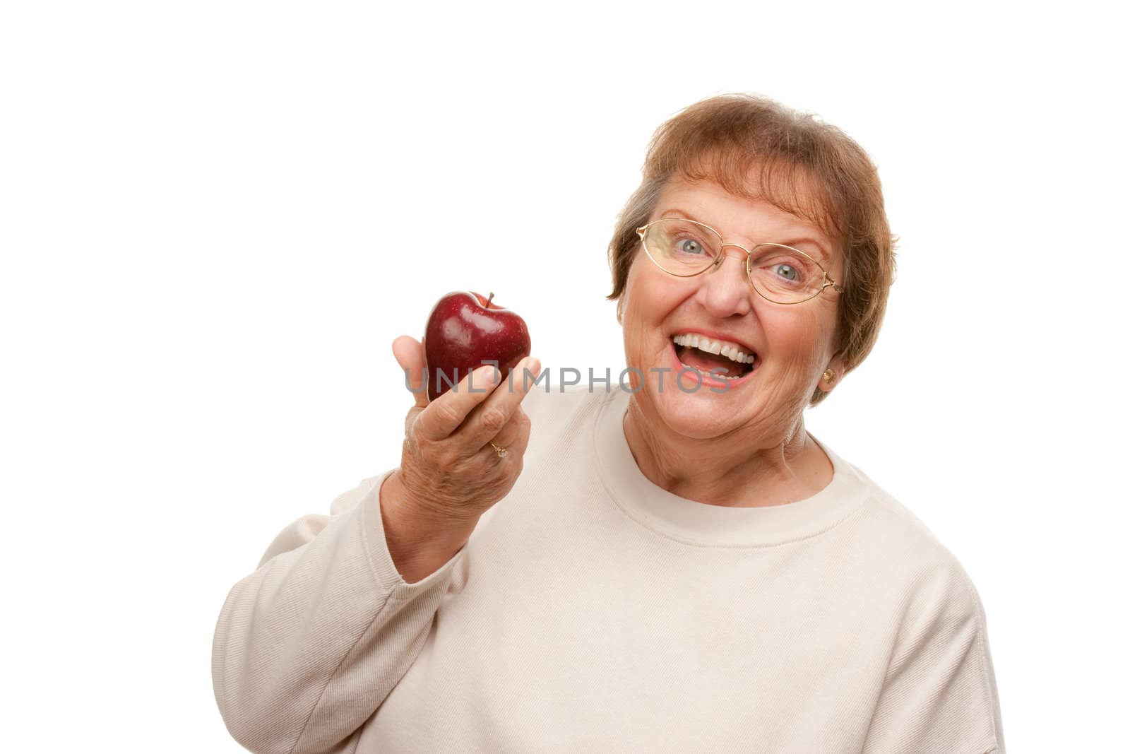 Attractive Senior Woman with Apple Isolated on a White Background.