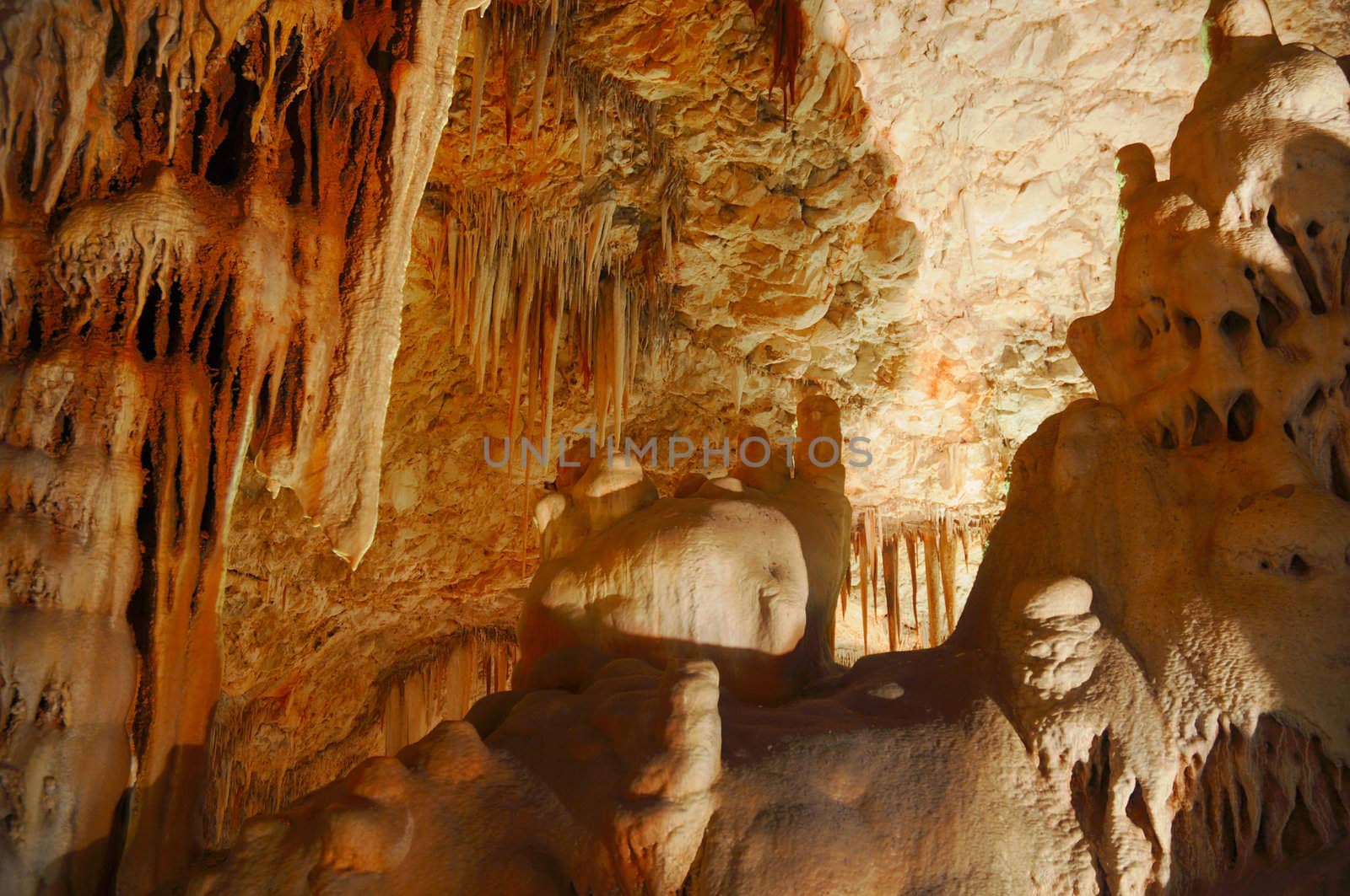 Image of the inside of a cave , details with stalactites .Israel .