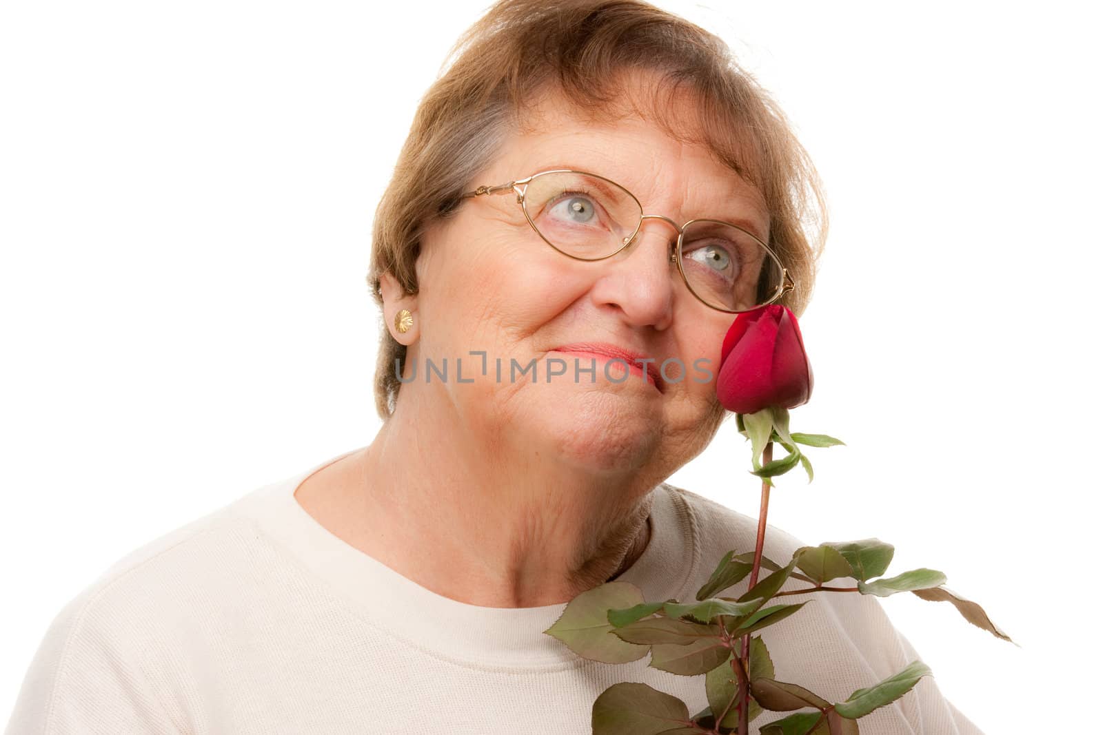 Attractive Senior Woman with Red Rose Isolated on a White Background.