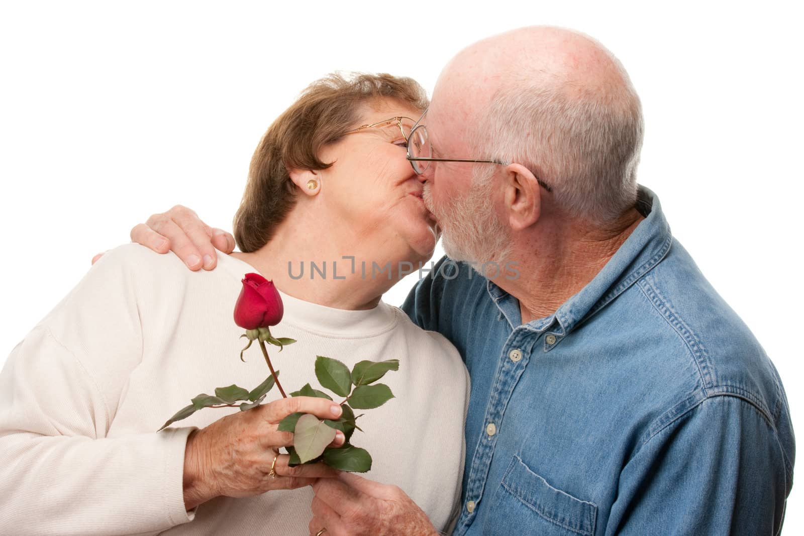 Happy Senior Couple Kissing with Red Rose by Feverpitched