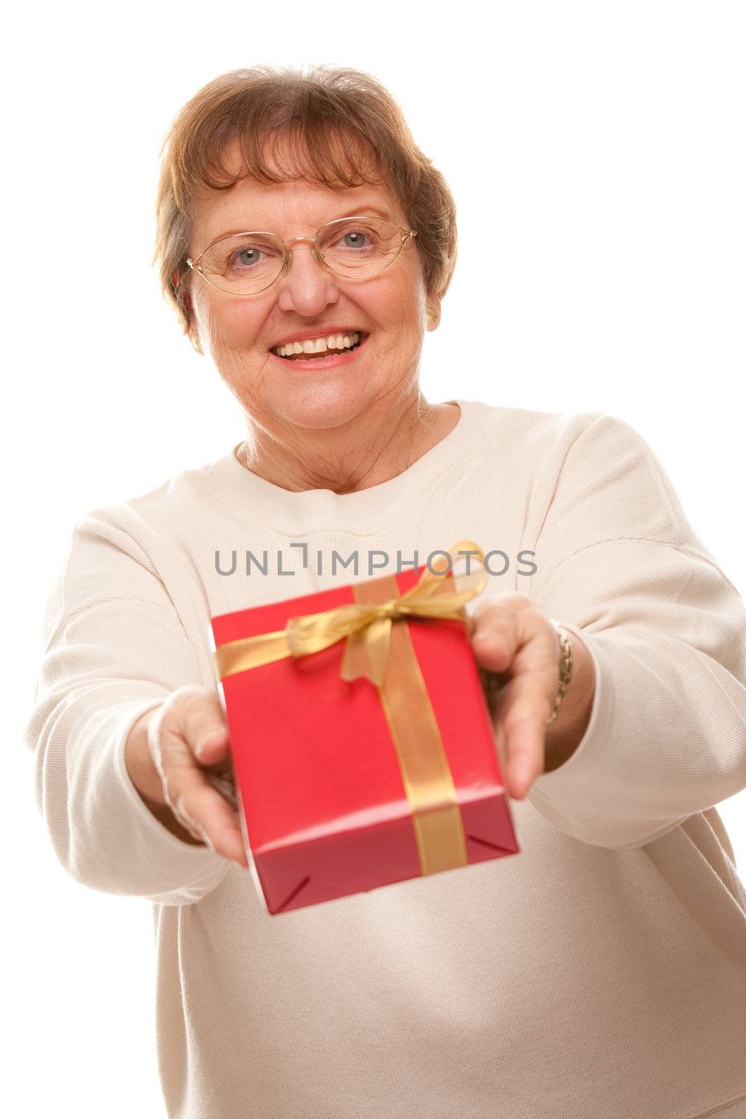 Attractive Senior Woman with Gift
 in Hands Isolated on a White Background.