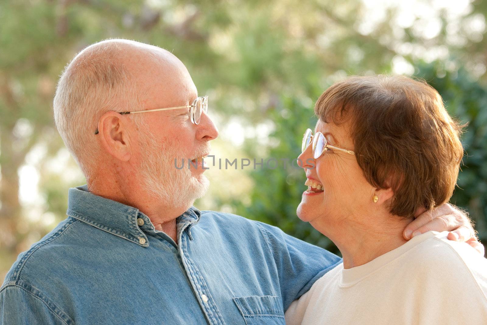 Happy Senior Couple Outdoor Portrait by Feverpitched