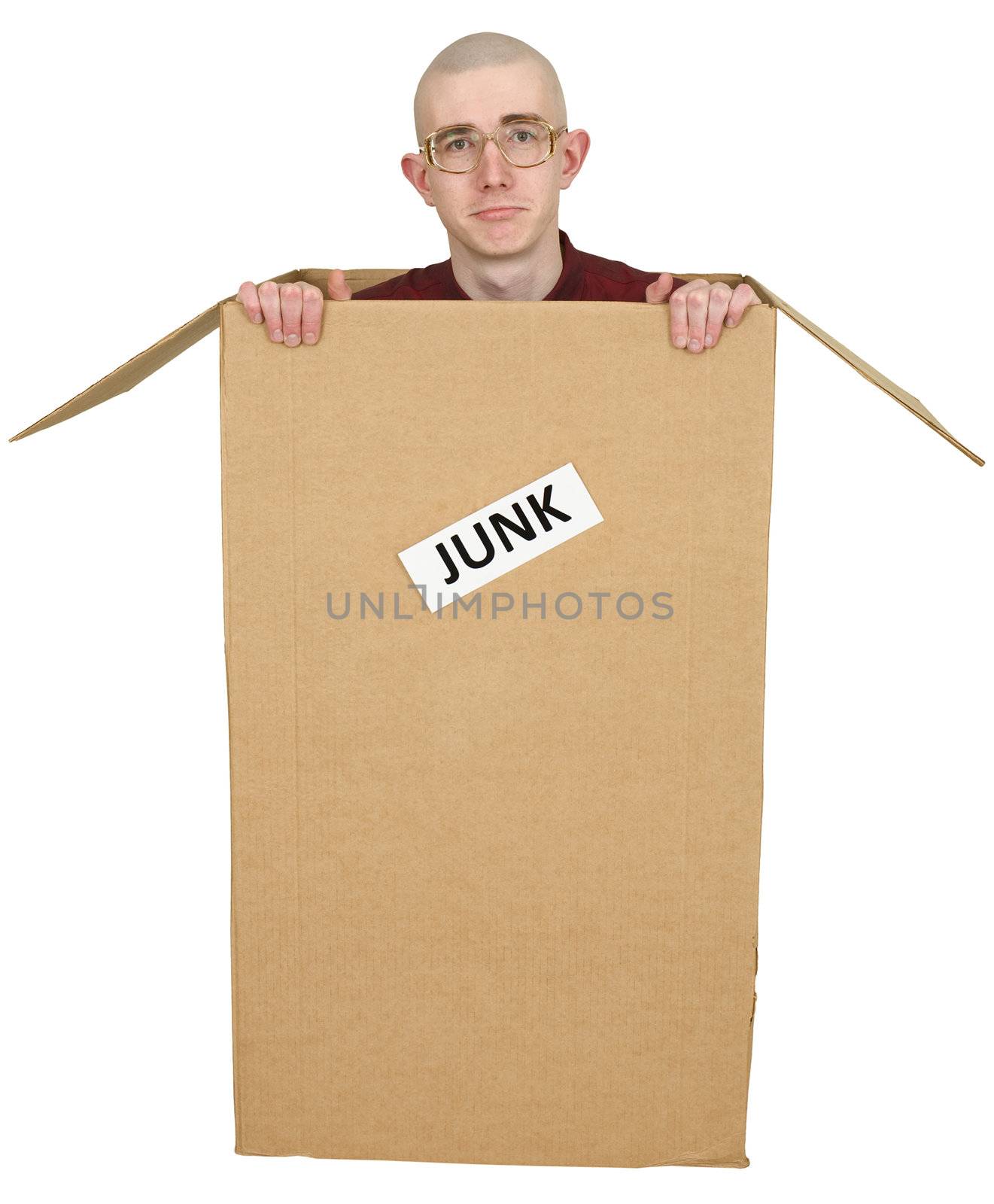 Man in carton with inscription "Junk"