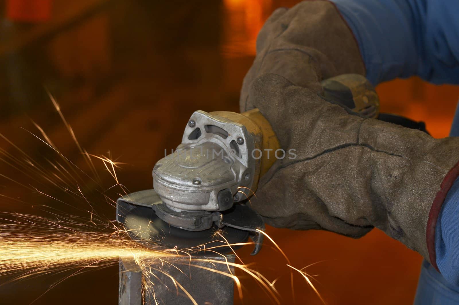 a close picture of a sparks on grinded steel