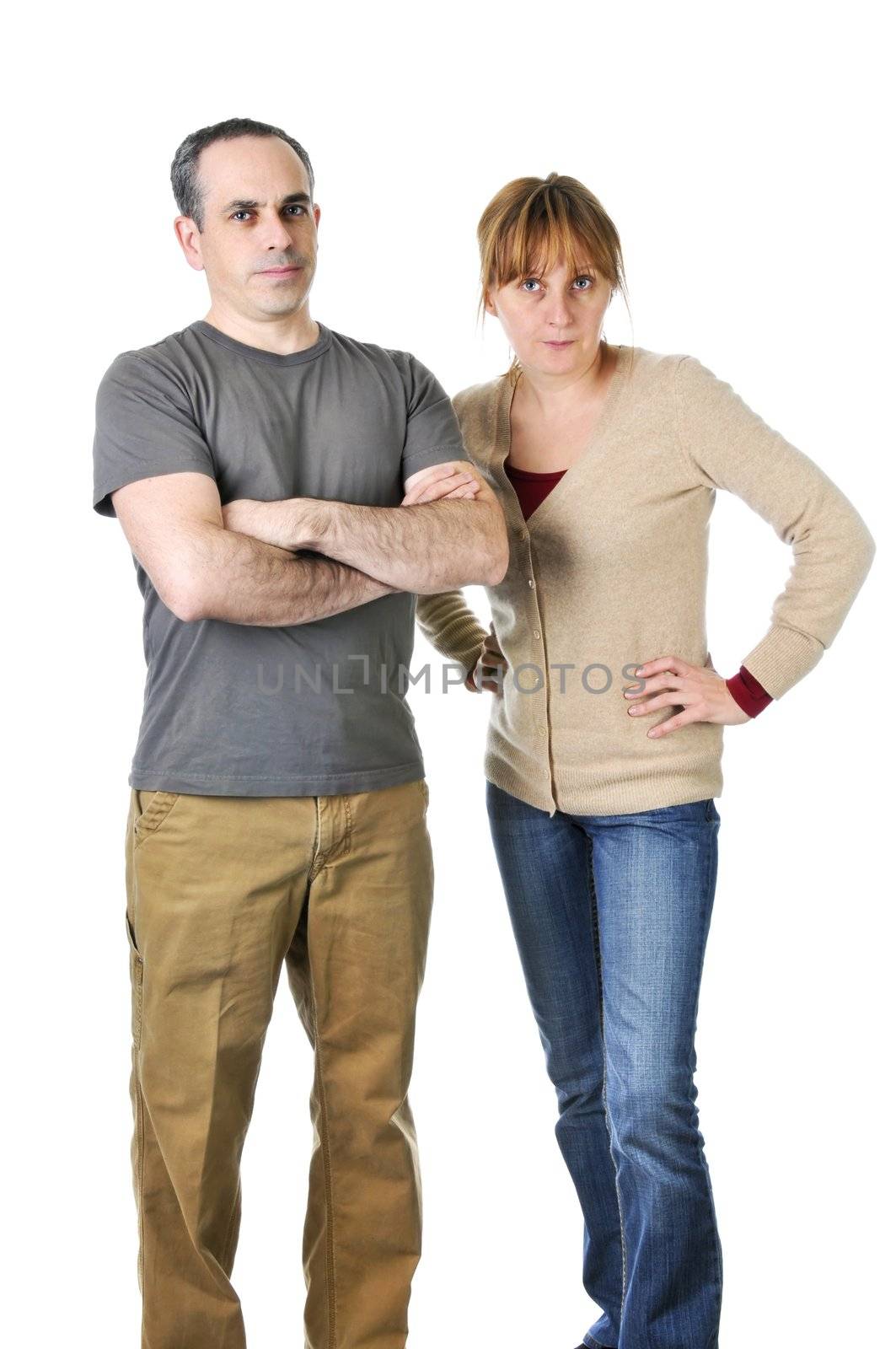 Angry parents stare with disappointment at the camera