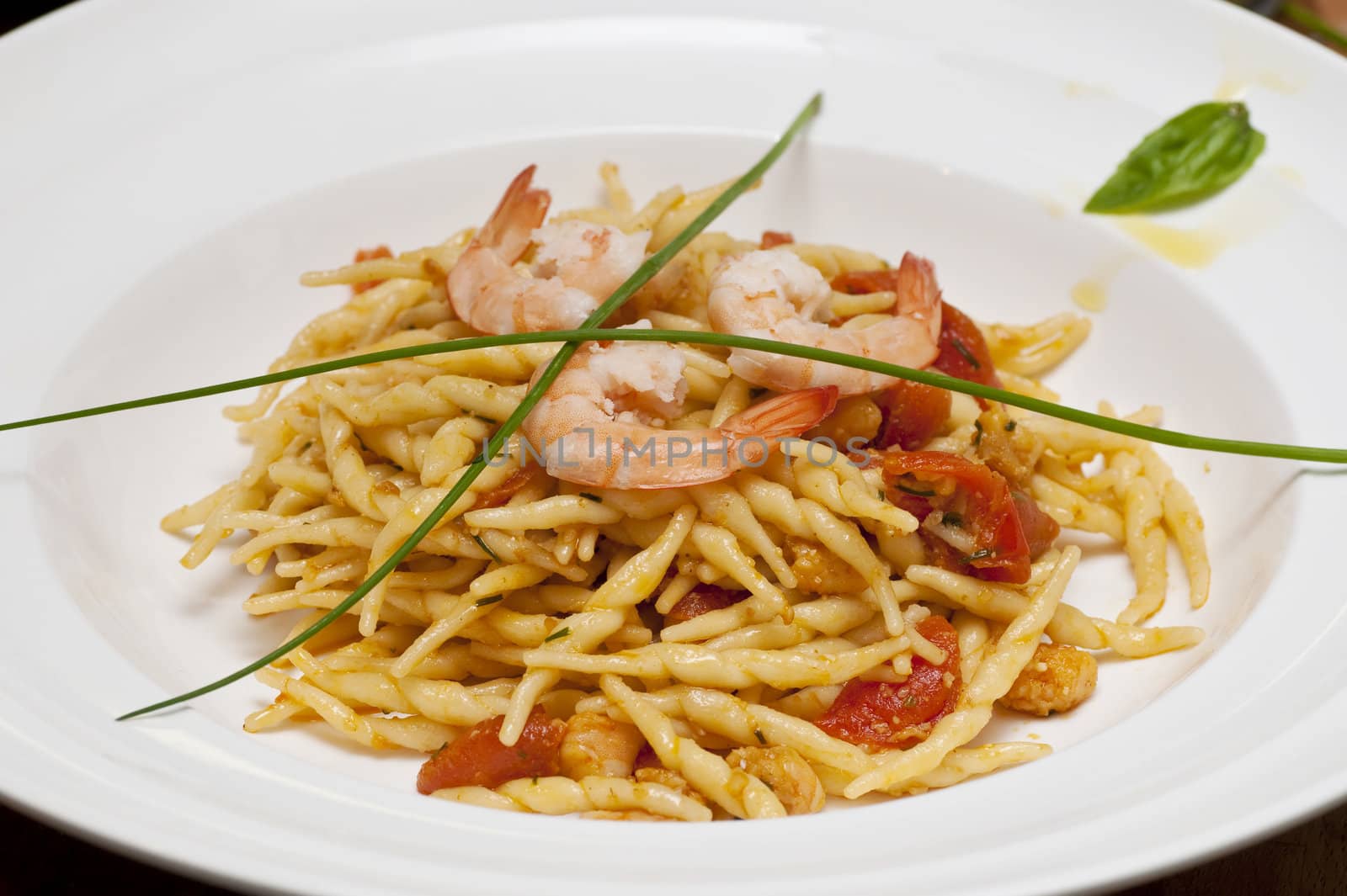 A first course dish with pasta and vegetables