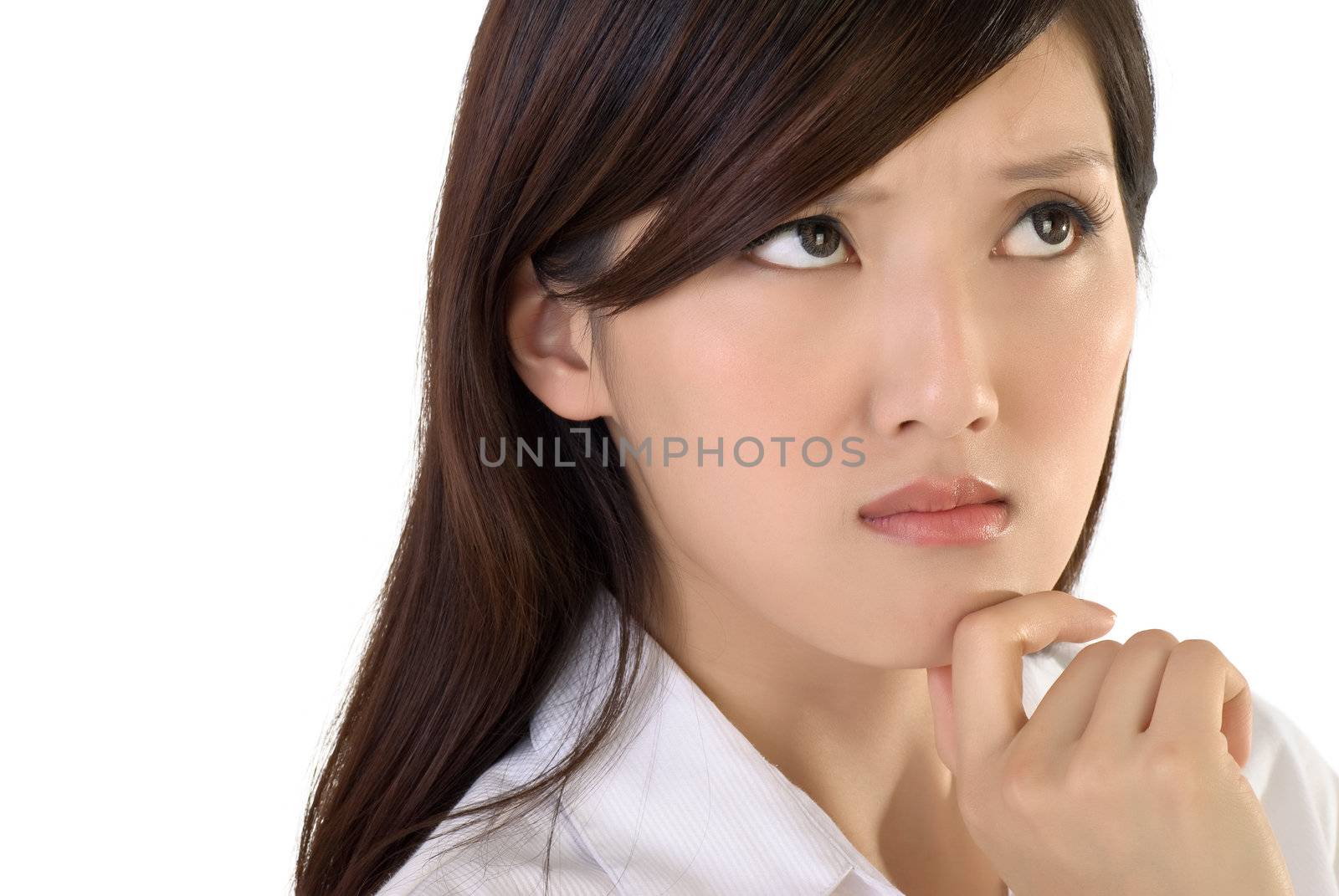 Worried business lady face, closeup portrait of oriental woman on white background.