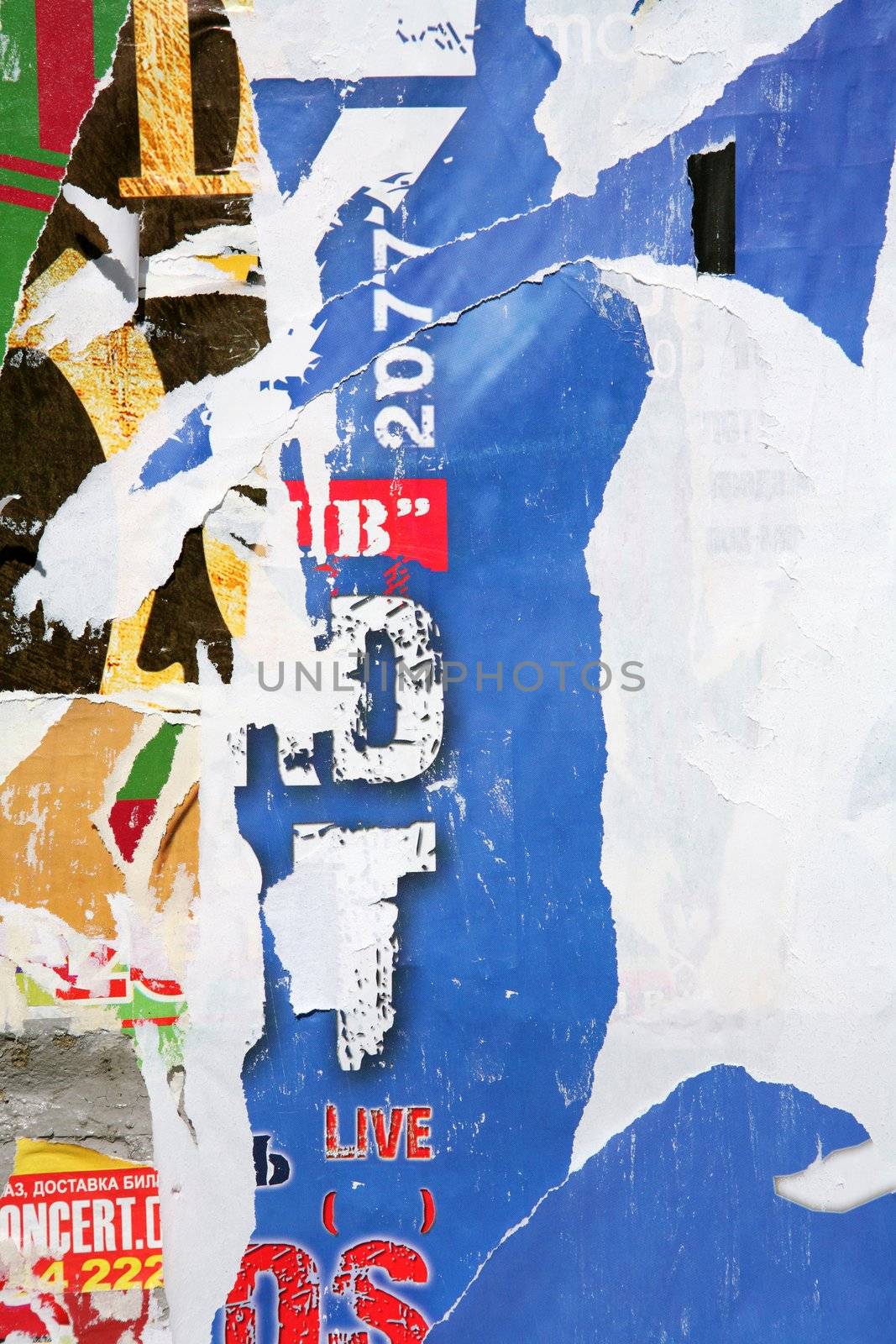 Texture, Varicoloured Concrete Wall with Scrap of the Posters and Announcements, Background