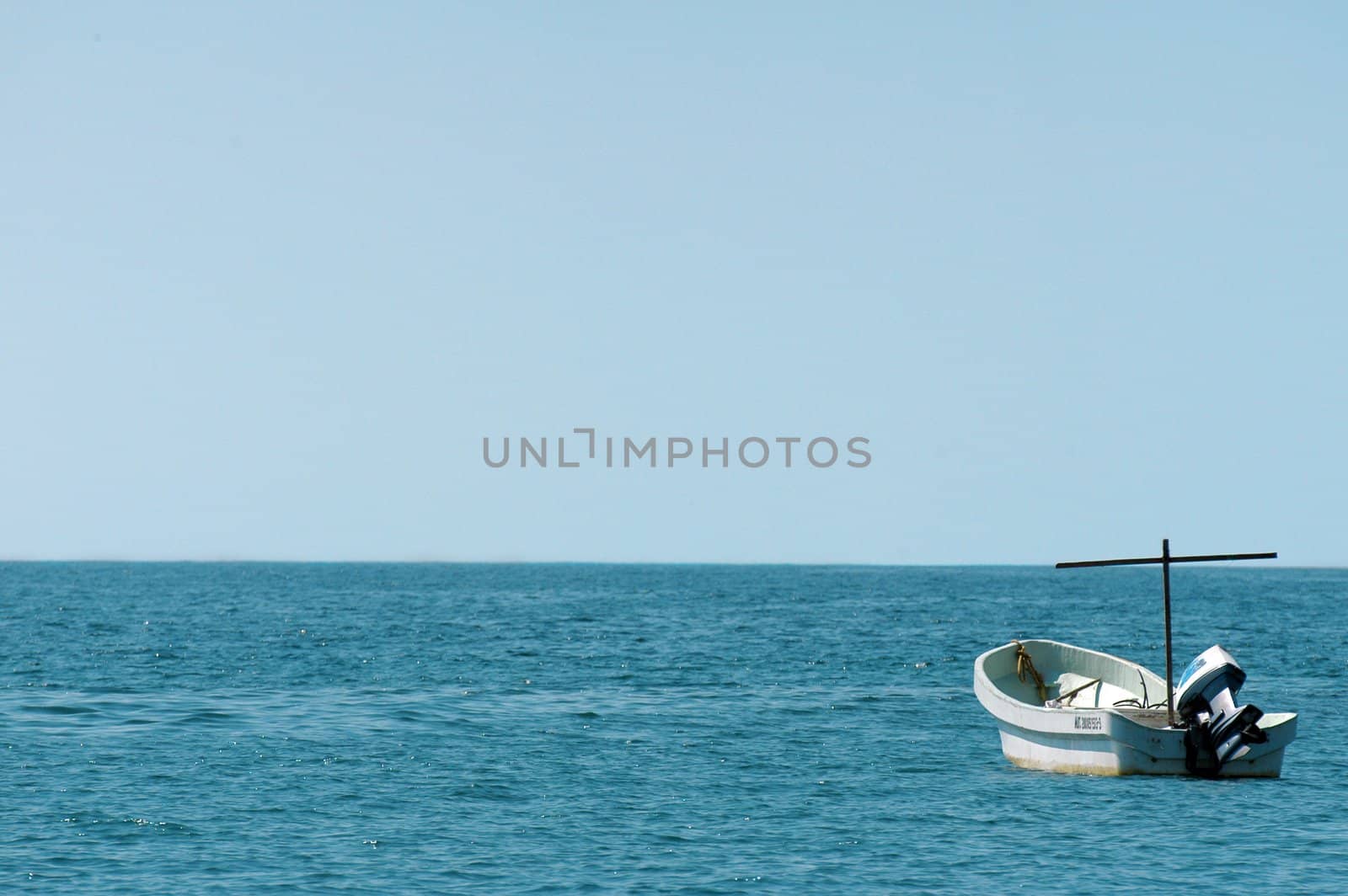 Single boat on the morning sea, Puerto Escondido, Mexico