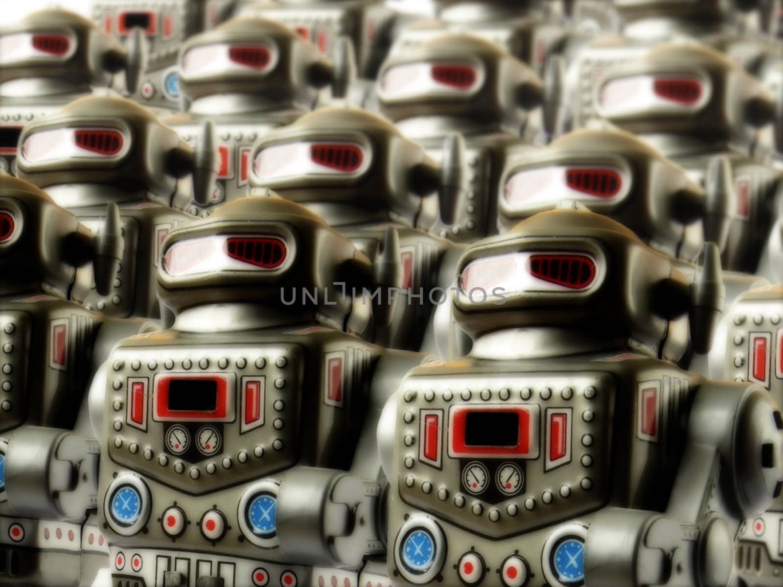 army of vintage toy clockwork robots; differential focus and sinister lighting
