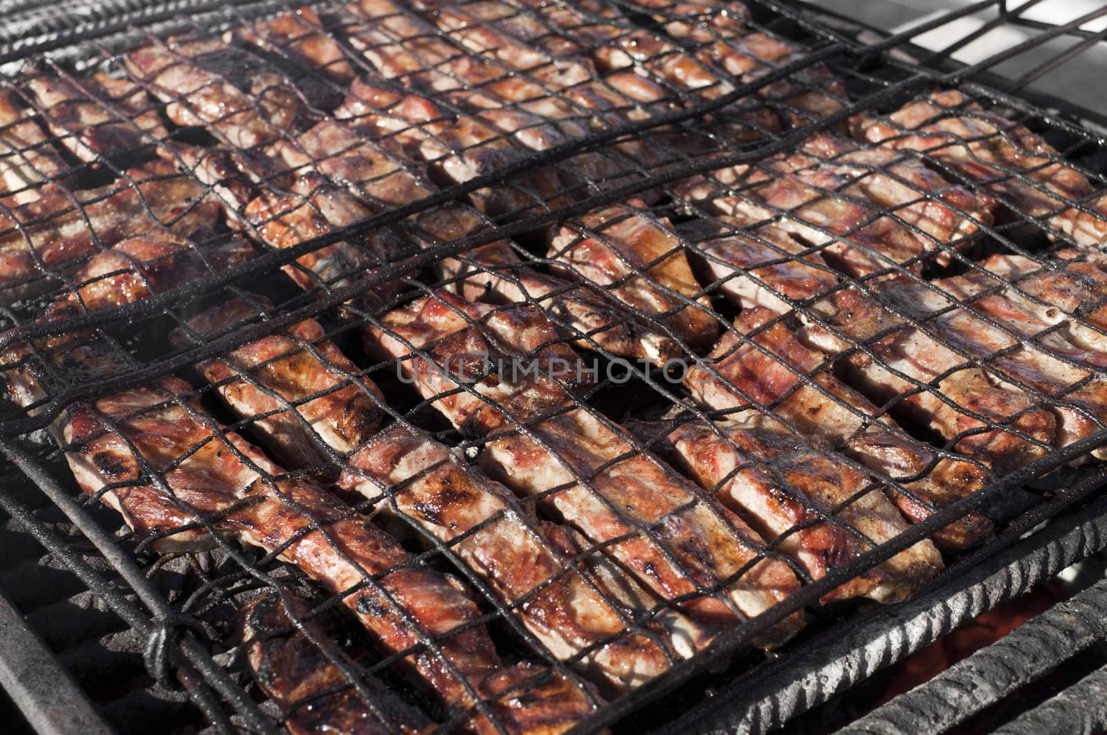 Meat pork on a italian festival barbecue grill