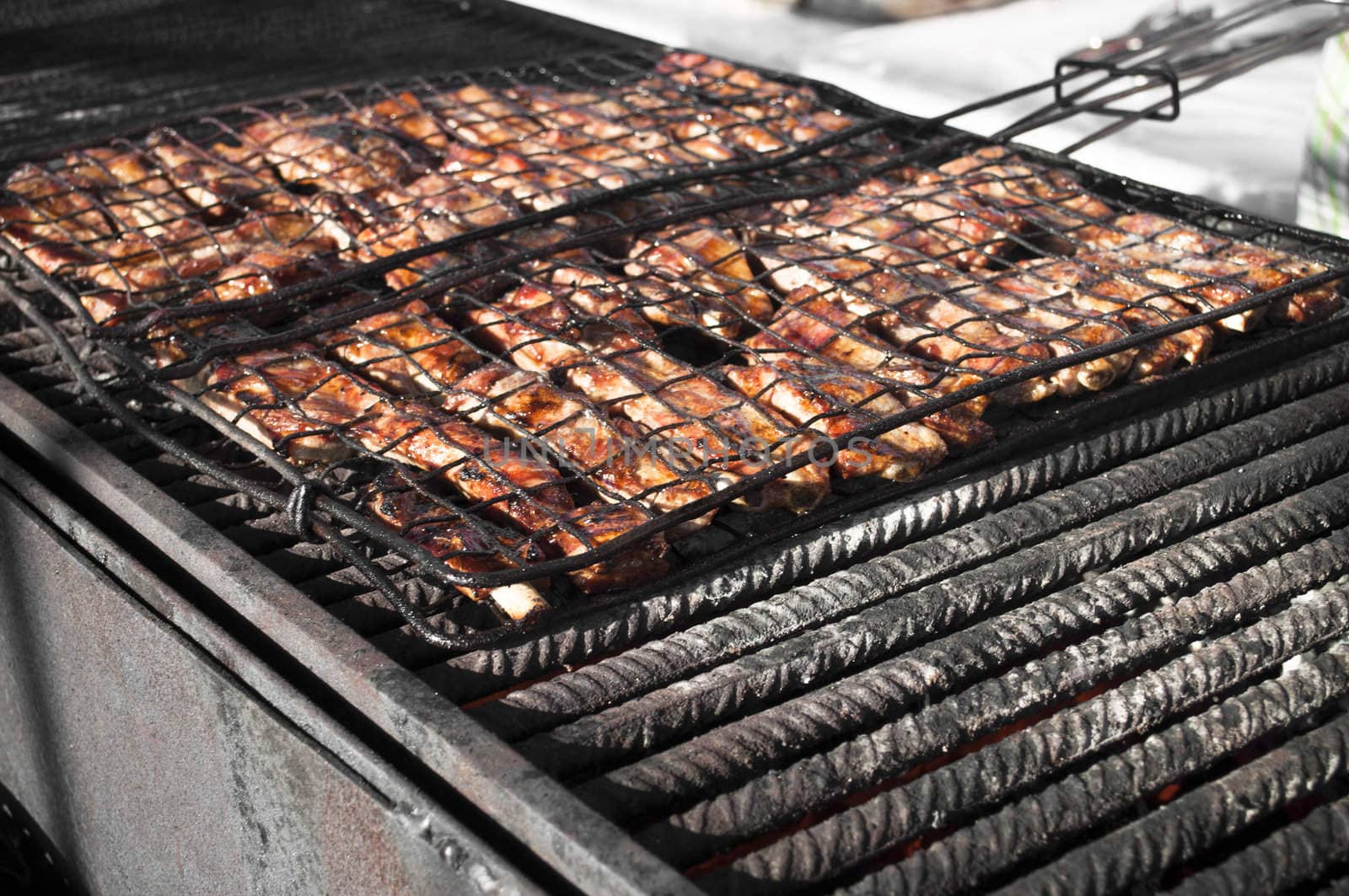 Meat pork on a italian festival barbecue grill