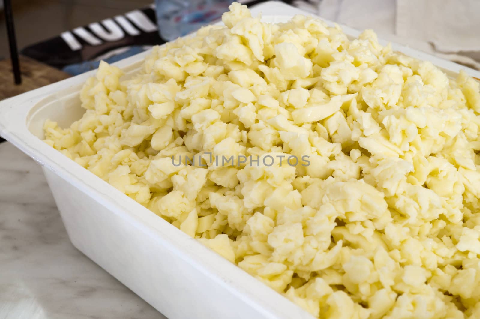 Italian mozzarella cheese cut and ready as pizza ingredient