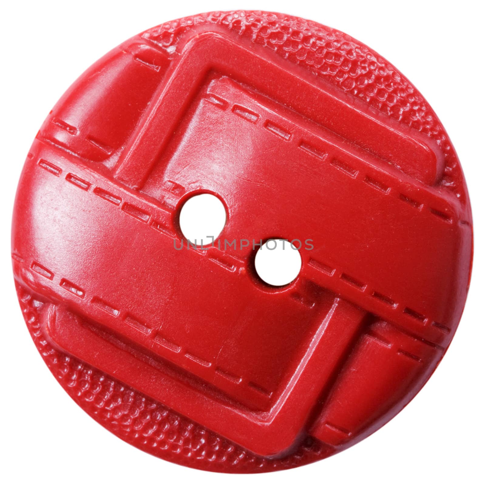 Red plastic button on the white background