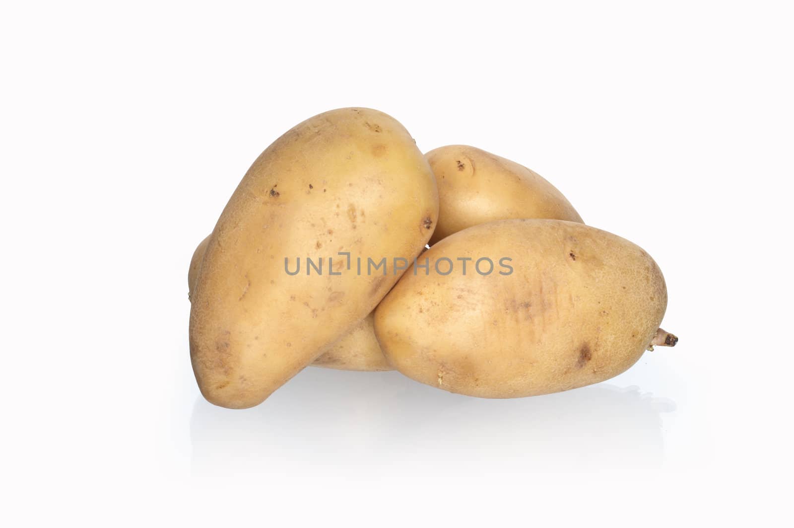 Few raw potatoes isolated on white background with clipping path