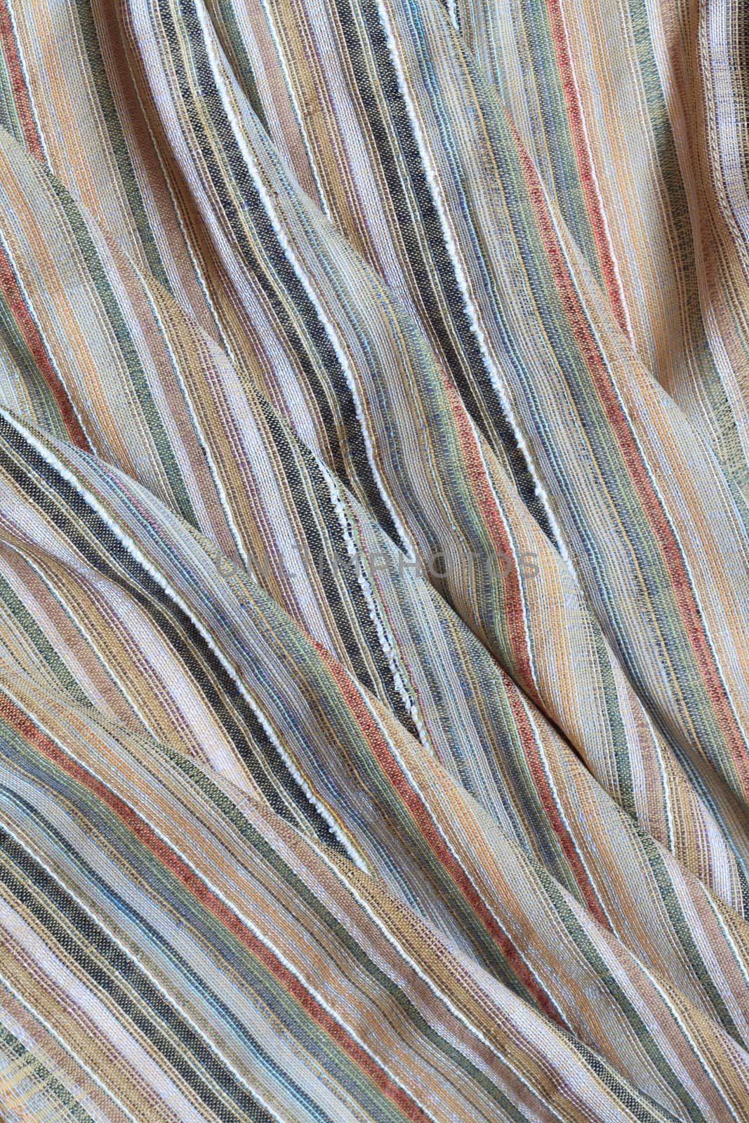 Background made from nice striped multicolored cotton fabric