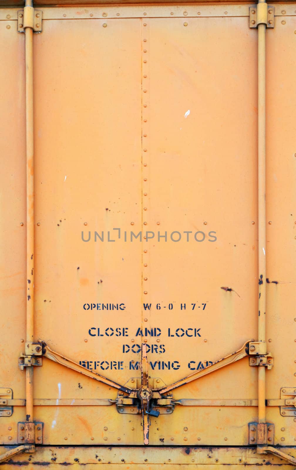 Yellow Orange old railroad car door and latch