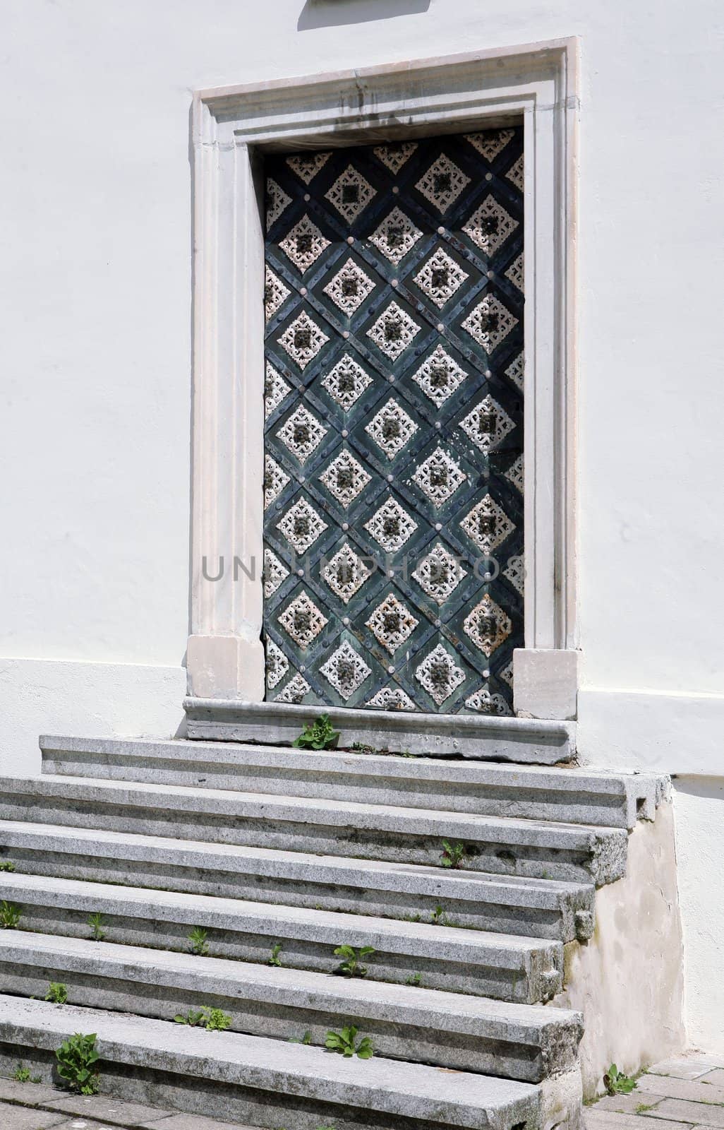 Heavy armored door on church in Vranov near Brno, Czech Republic