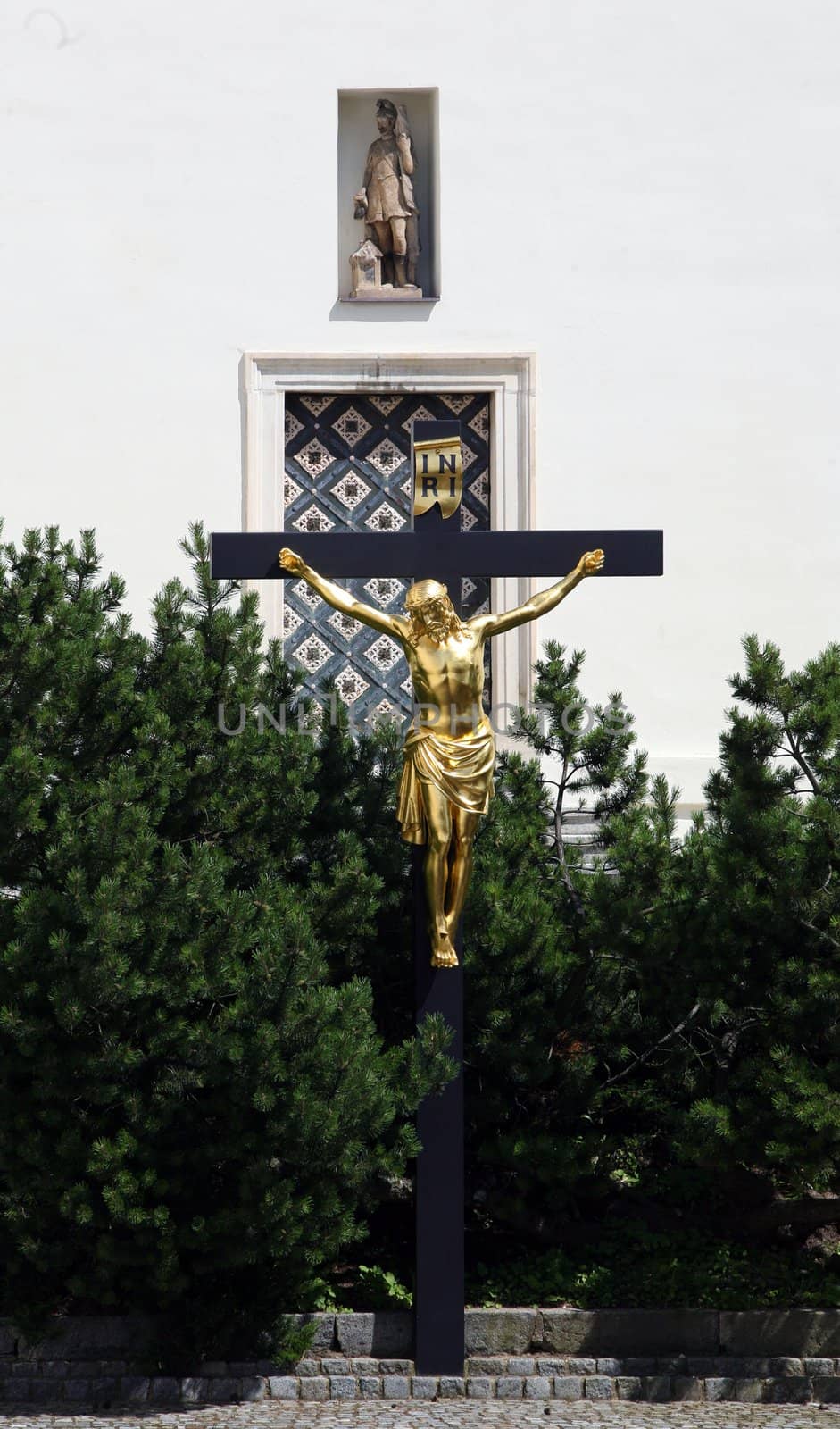 Crucifix in front of the church in Vranov near Brno, Czech republic