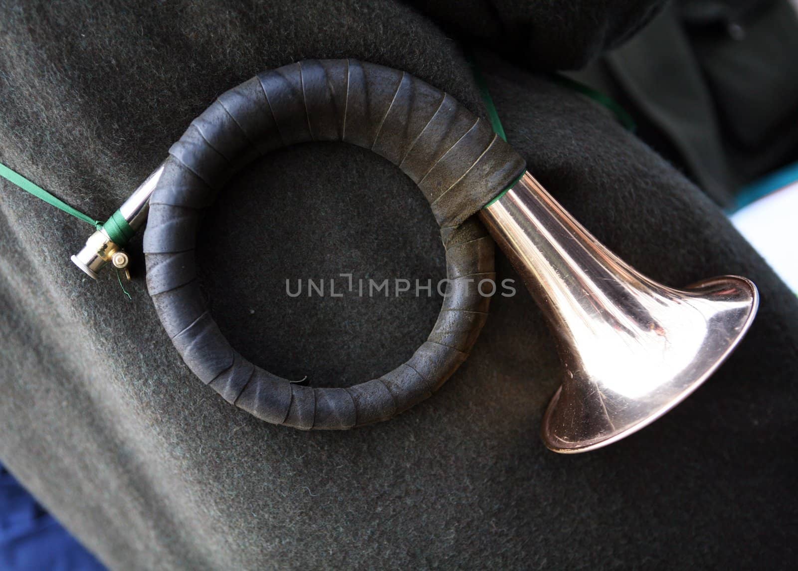 Hunting horn with leather enclosure an green band