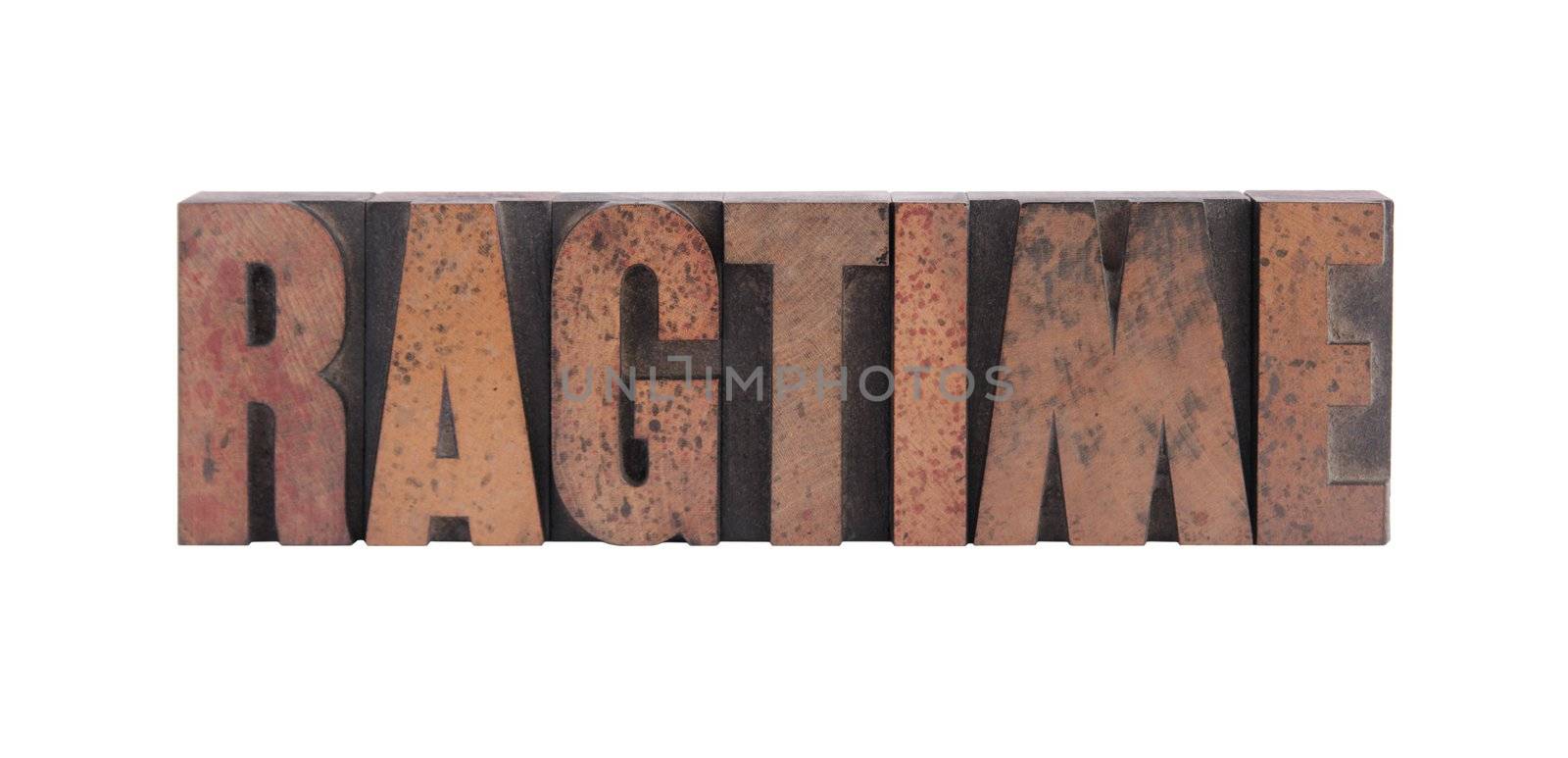 the word 'ragtime' in old, ink-stained wood type