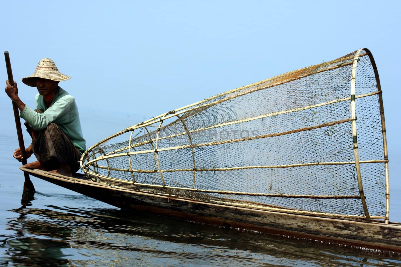 Myanmar fisher working in Inle Lake.