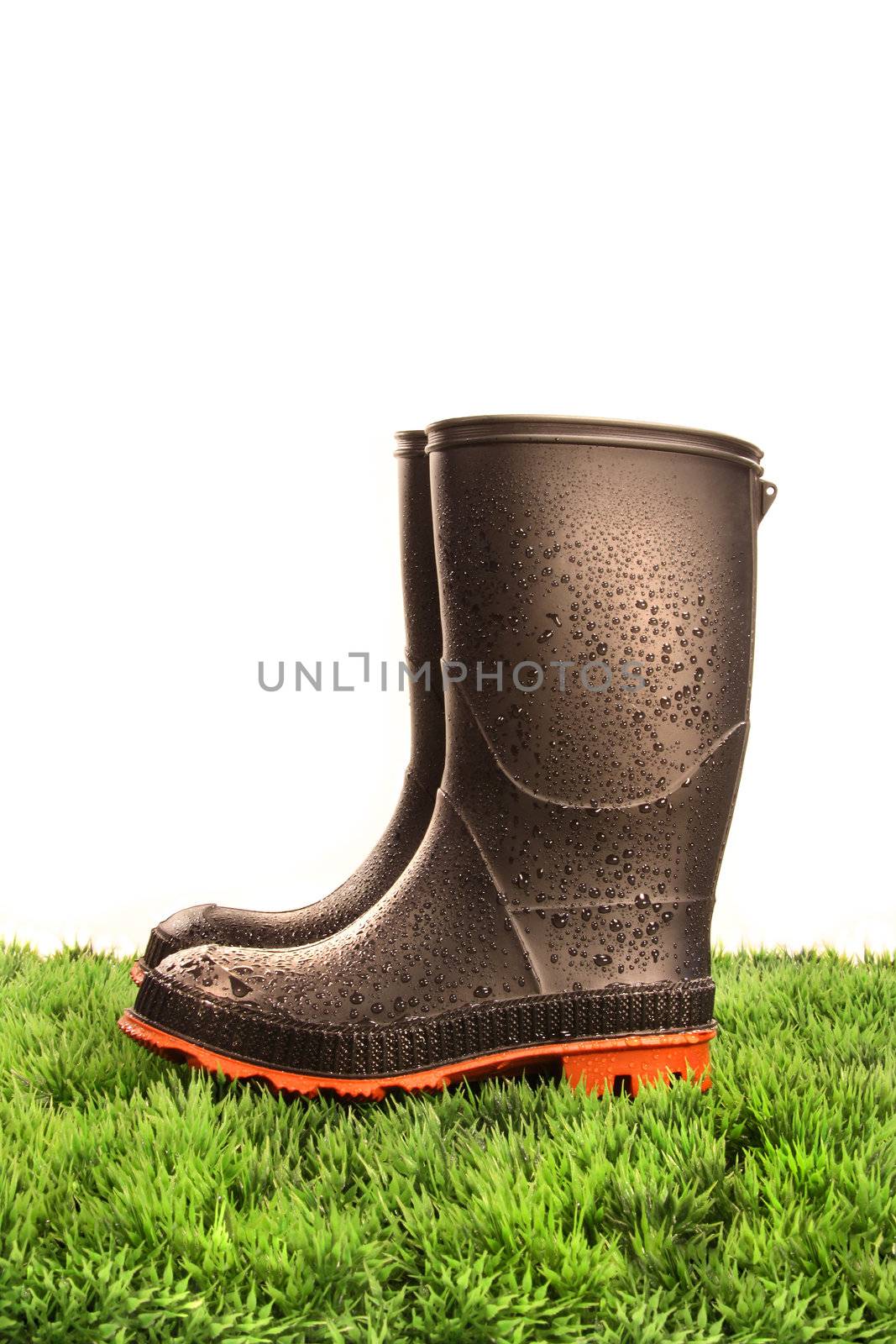 Pair of black rubber boots by Sandralise
