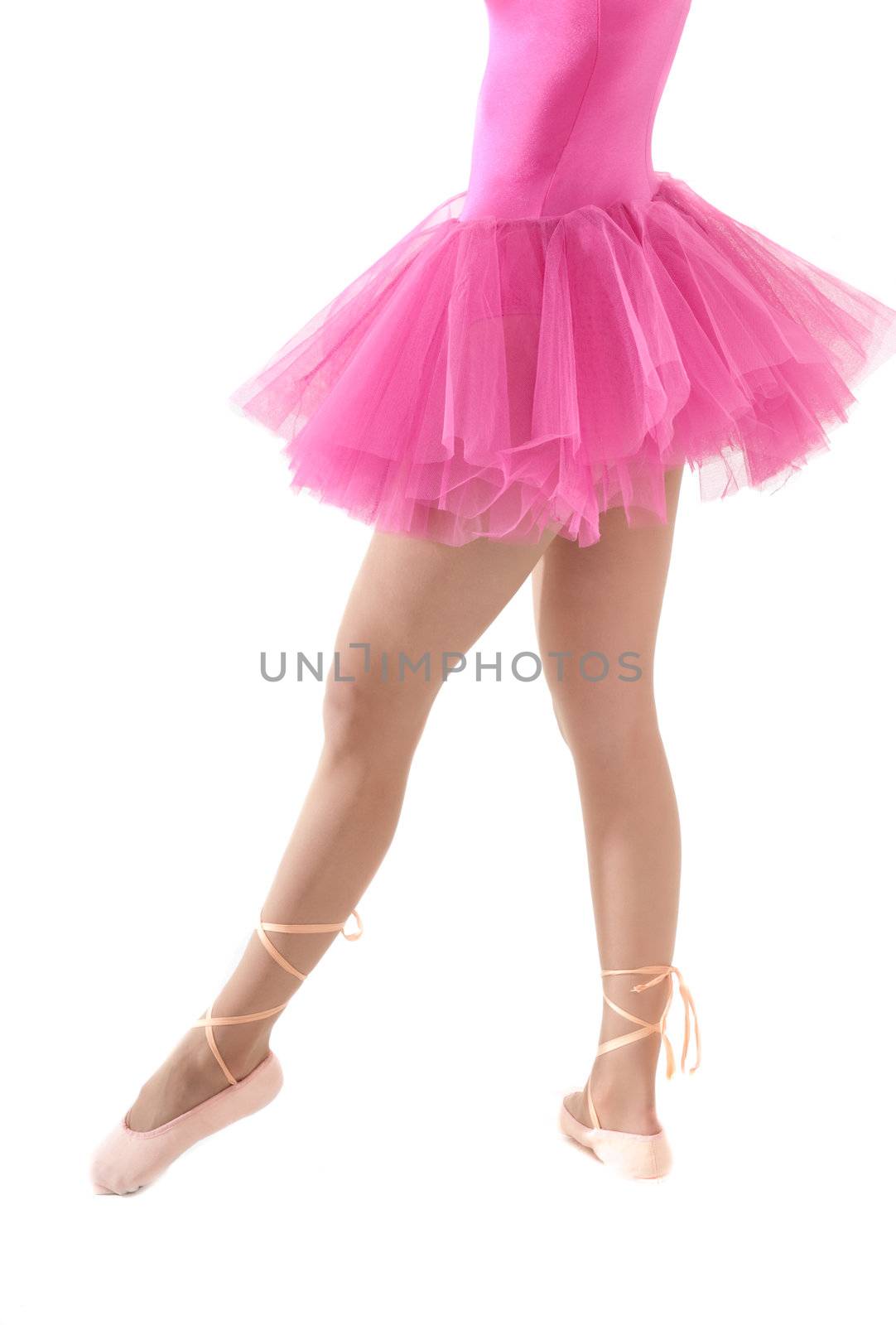 Unrecognizable female dancer body with tutu isolated on white background by dgmata