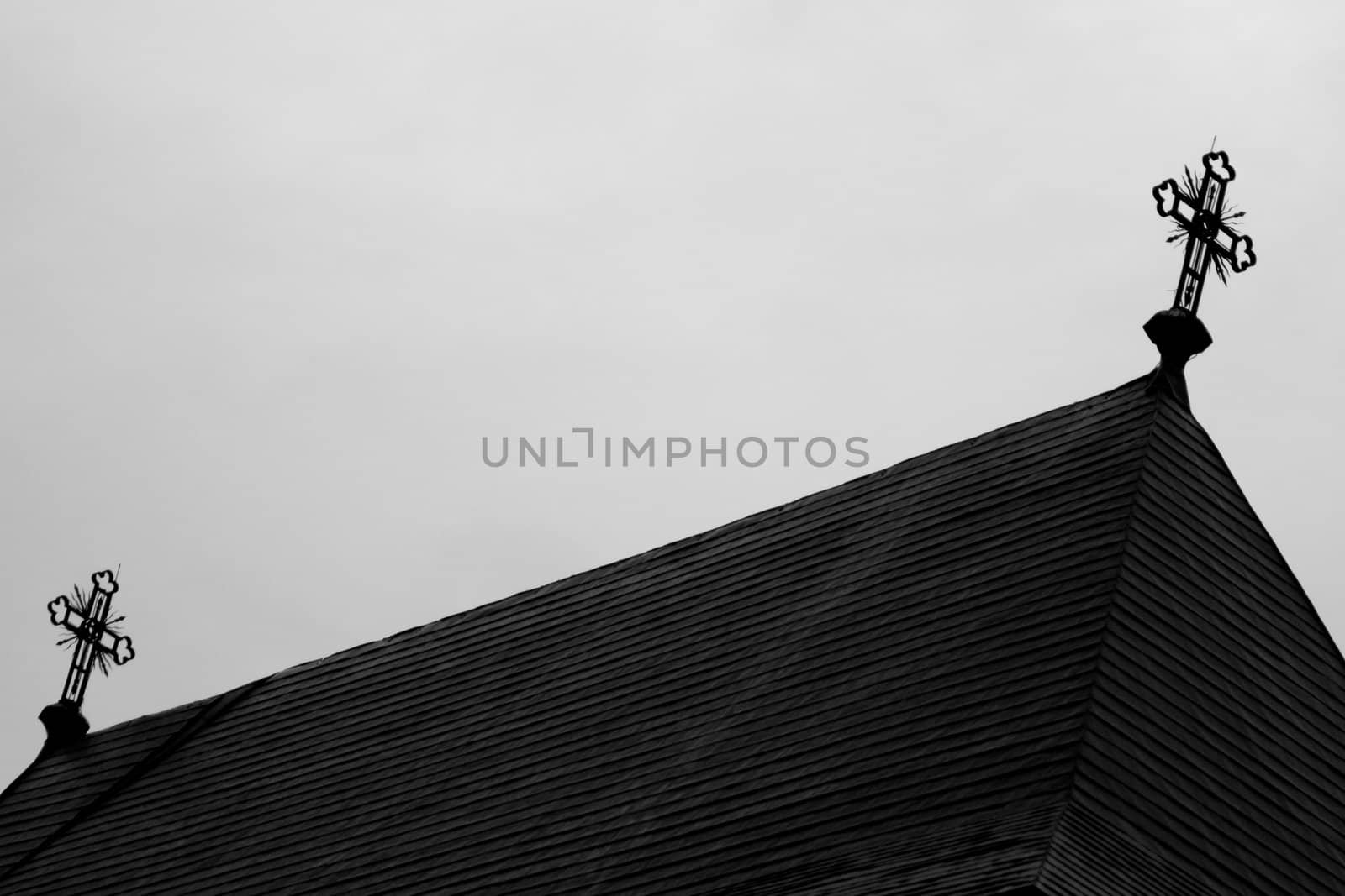 Detail of old church roof on overcast day