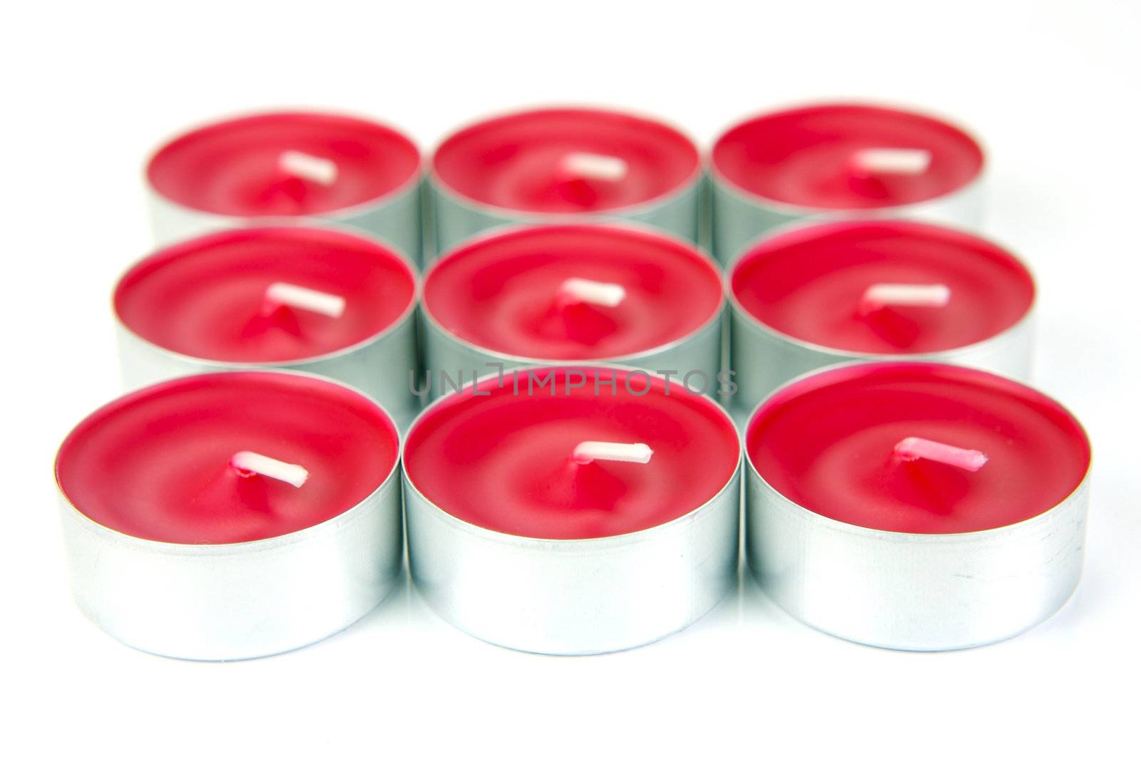 Scented candals isolated against a white background