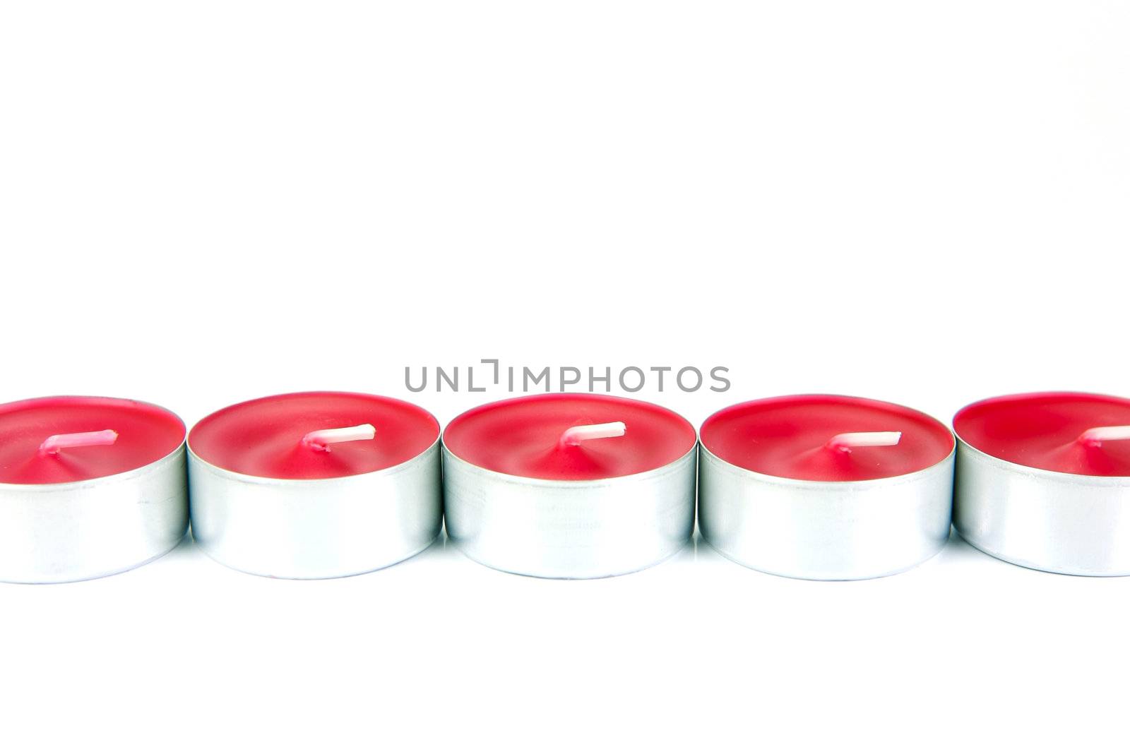 Scented candals isolated against a white background