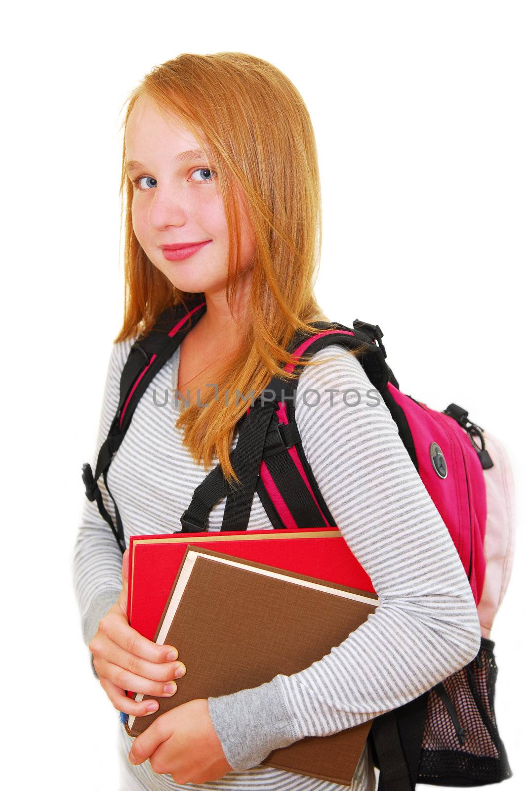 Young smiling school girl with backback and books isolated on white background