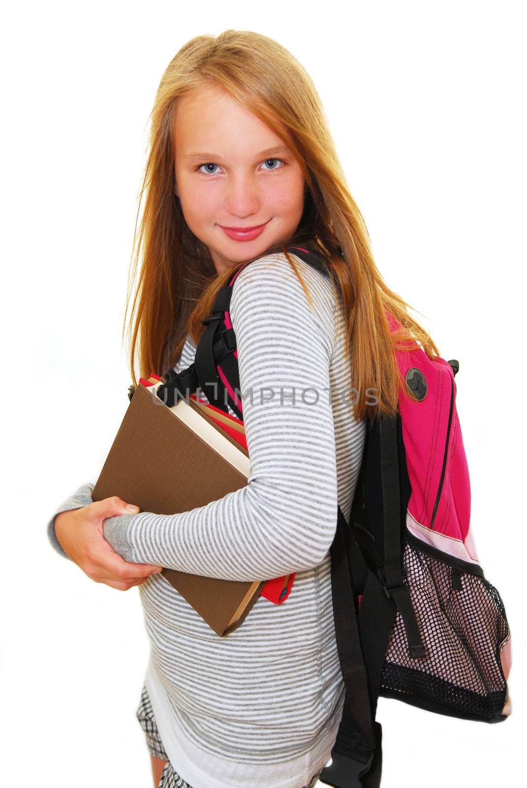 Young smiling school girl with backpack and books isolated on white background