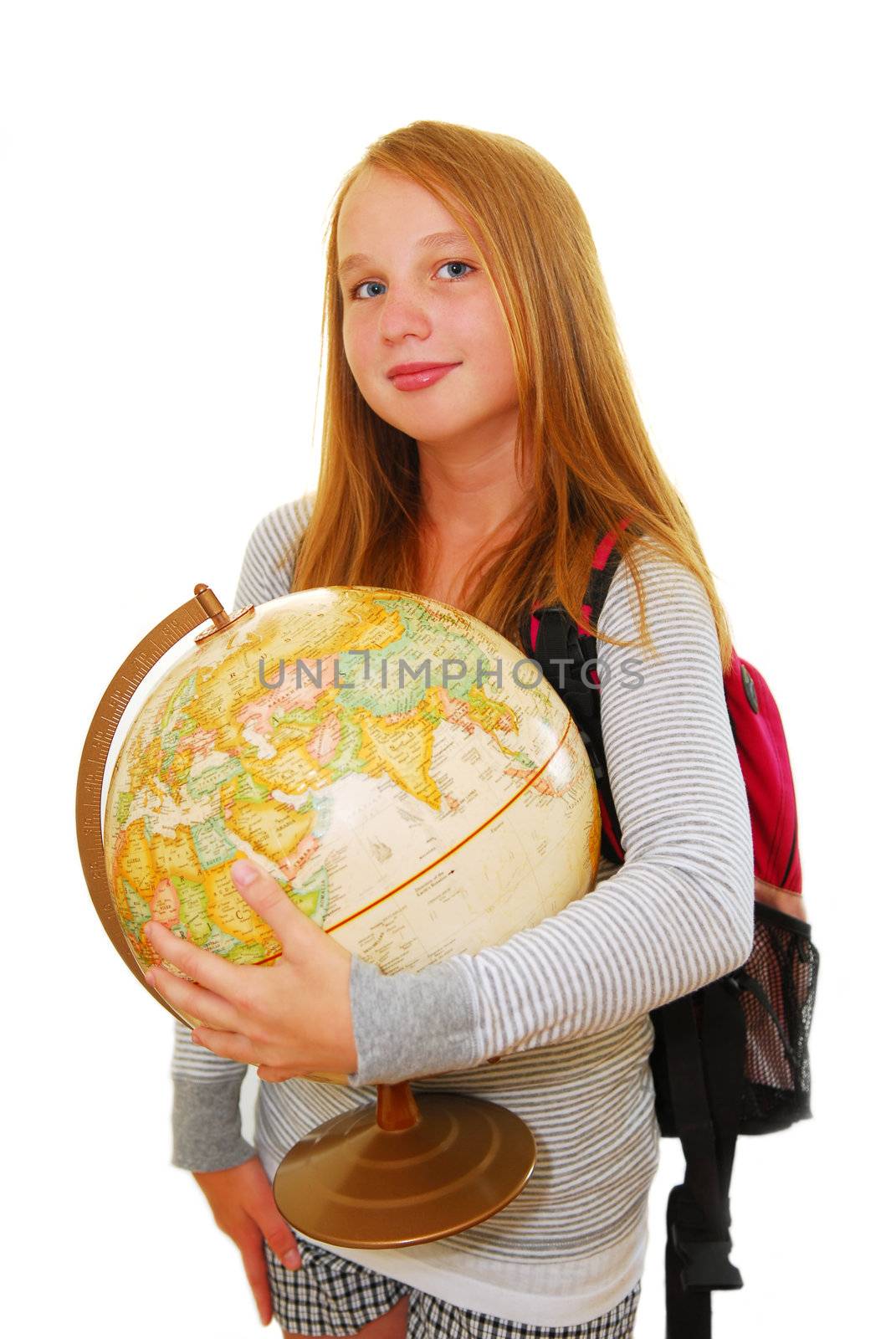 Young smiling school girl with backpack and globe isolated on white background