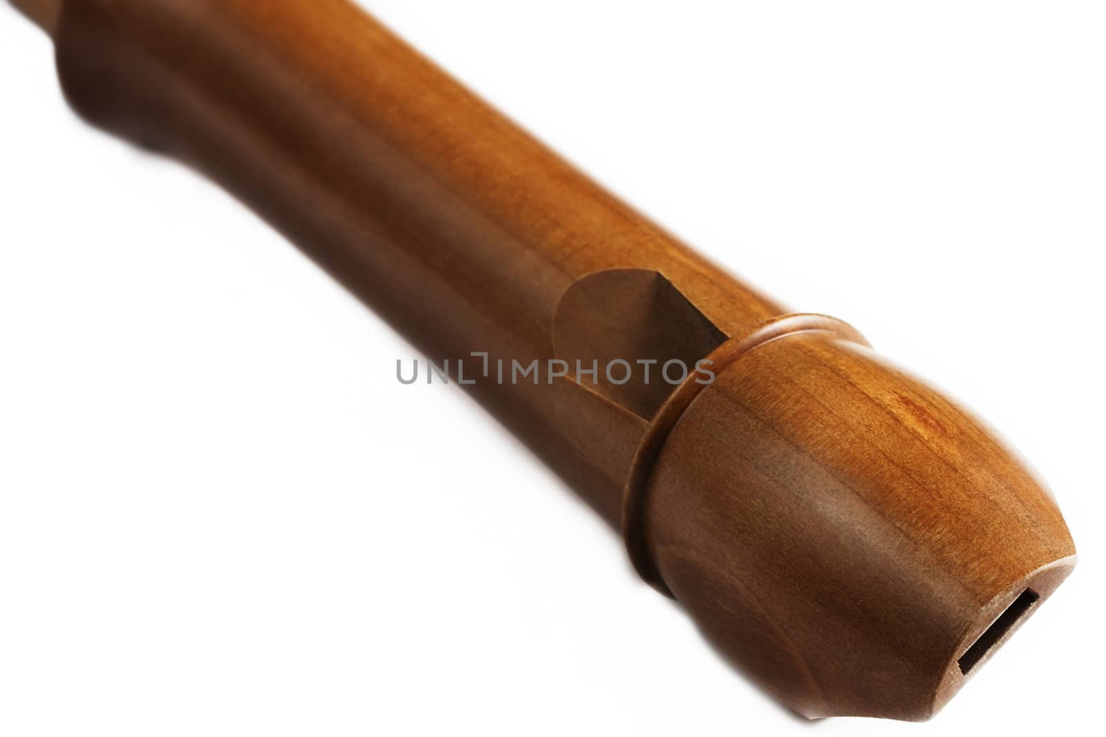 diagonal closeup of an wooden treble flute