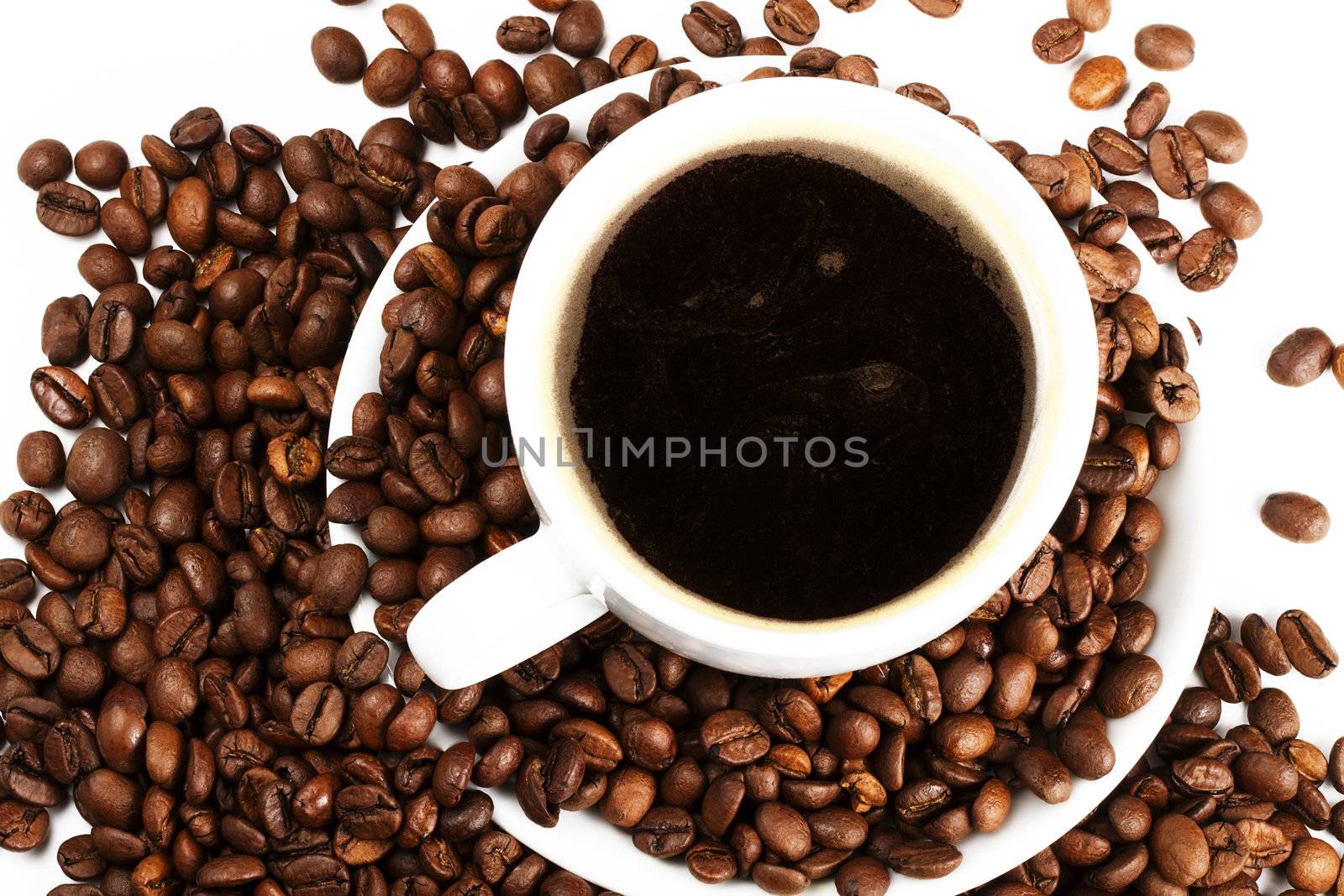 coffee cup with coffee beans from top