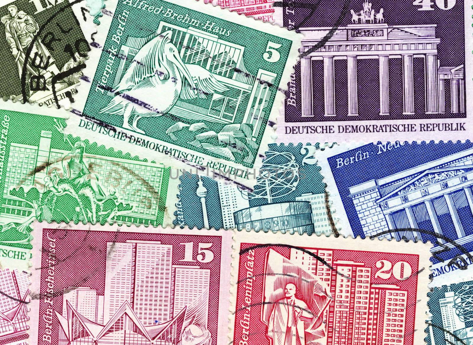 collage of old GDR stamps showing places in eastern berlin