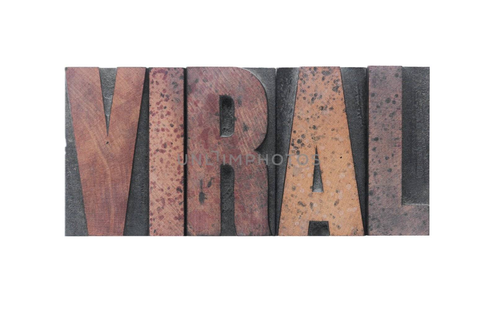 the word 'viral' in old ink-stained wood type