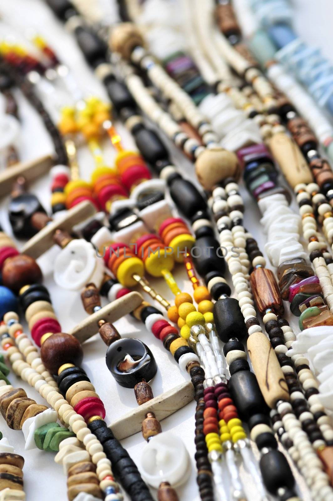 Wood and seashell bead necklaces close up