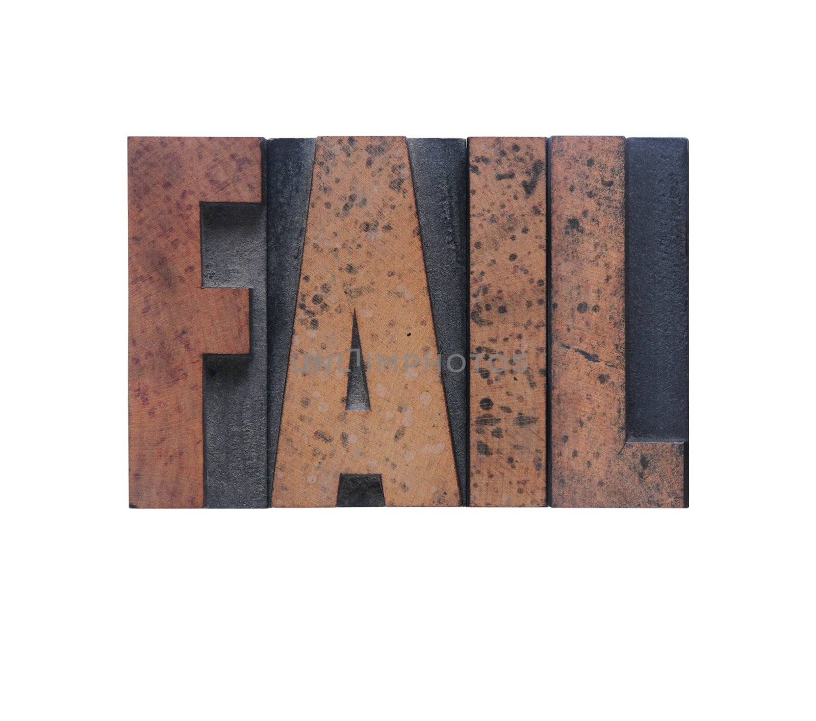the word 'fail' in old ink-stained wood type 